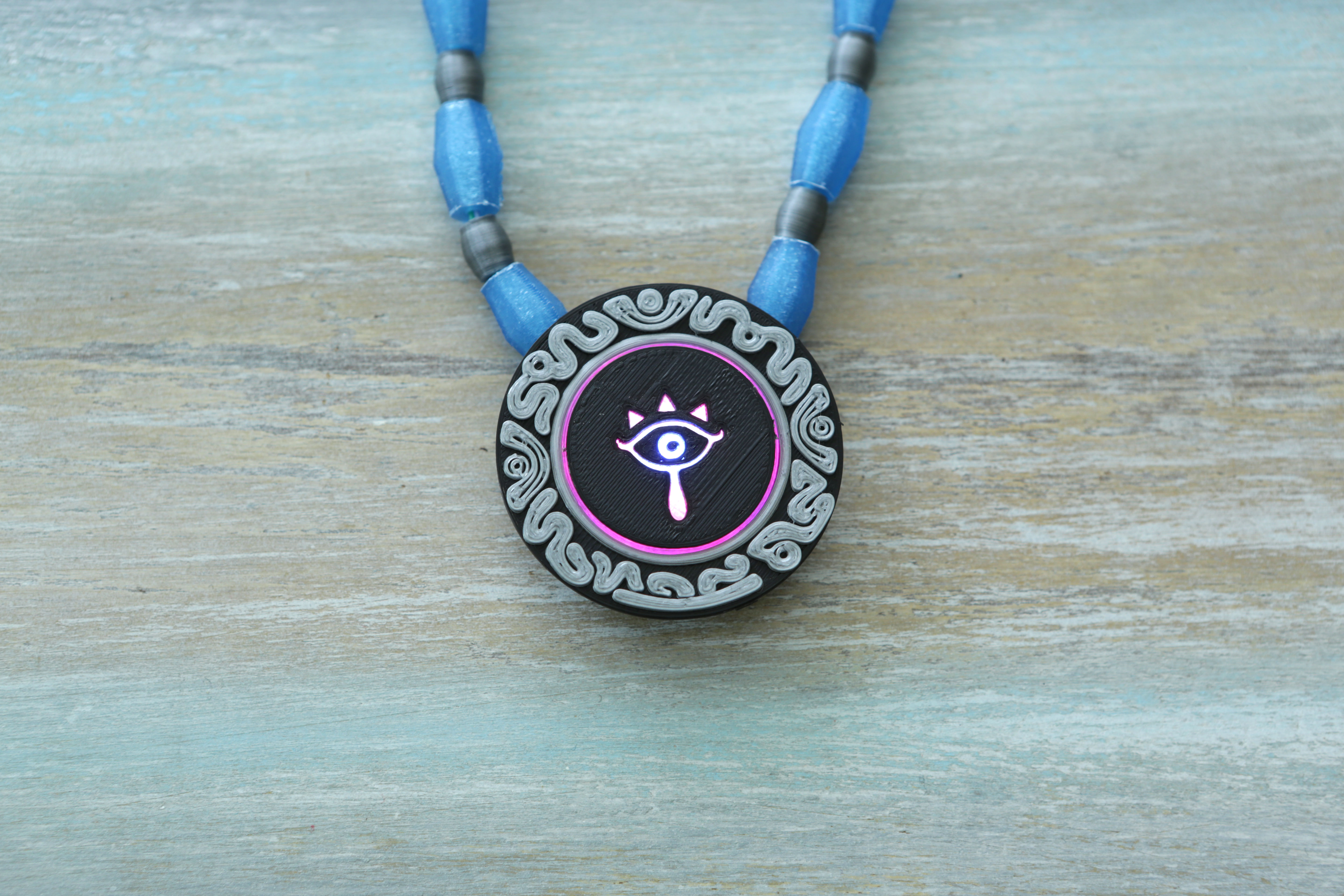 Sheikah Pendant – NeoPixel Jewelry with GEMMA M0