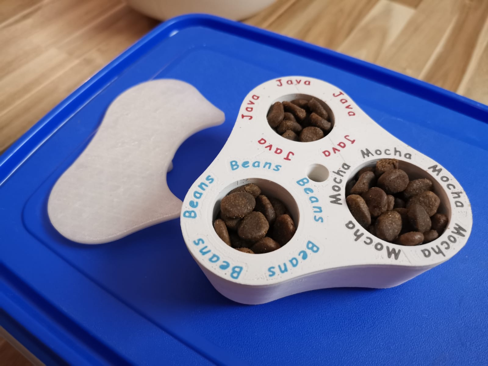Measured dog feeder for 3 dogs with different volumes of food