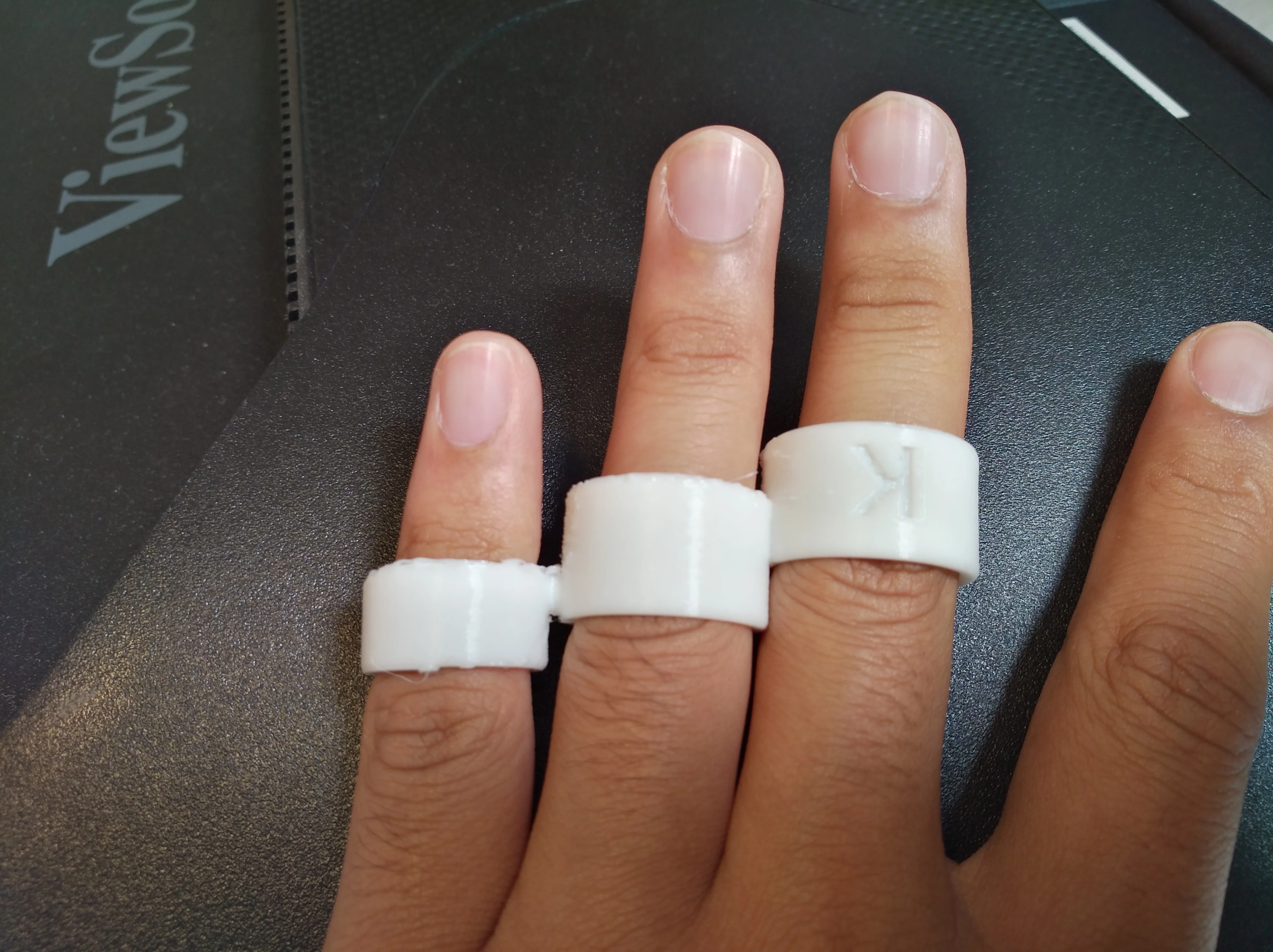 [K] Orthèse de syndactylie (Syndactyly orthosis)