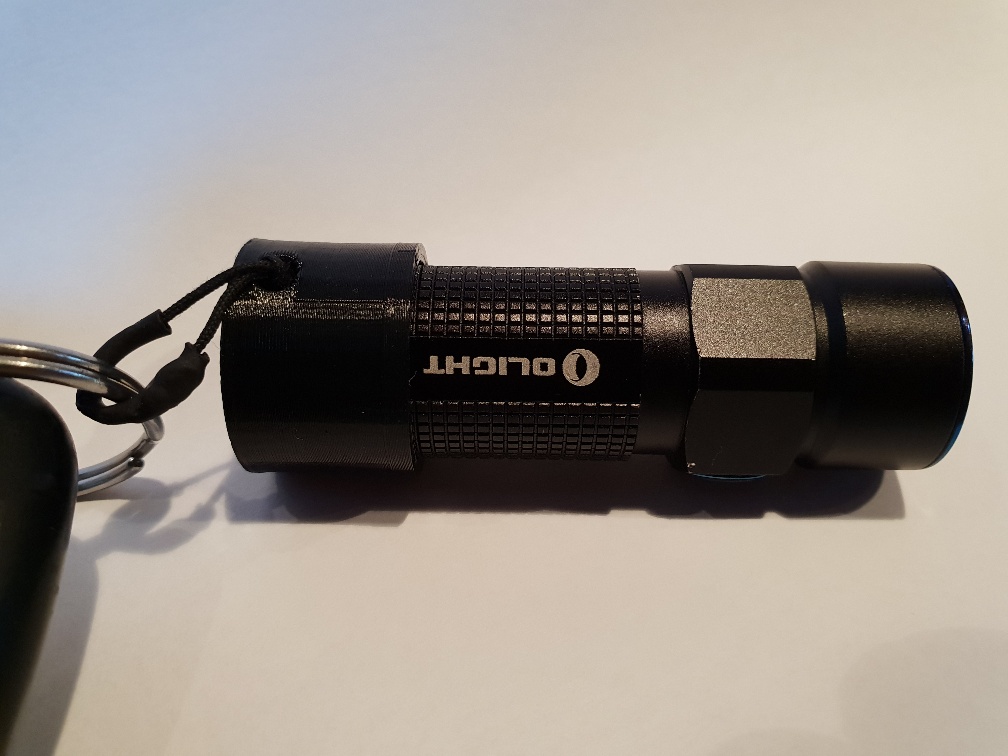 Olight S1R battery cap with lanyard hole