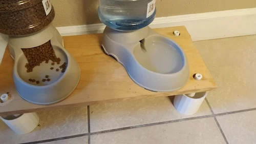 Pet food table ant water barrier legs