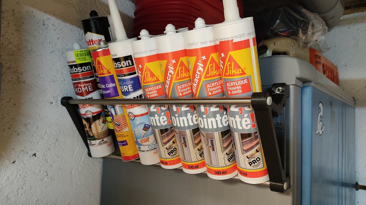 Cartridge and spray paint holder wall mount
