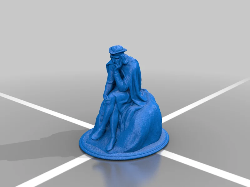 statue of a man sitting on a stone