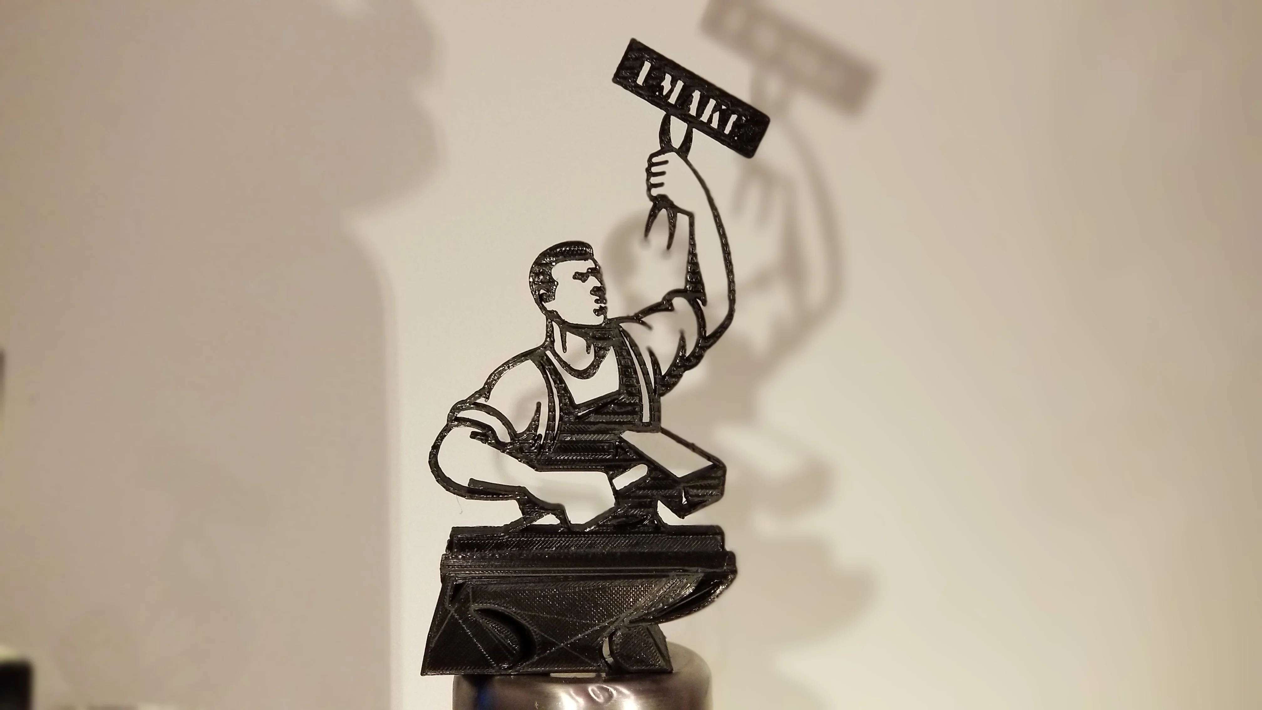 "I Make Man" Phone Stand