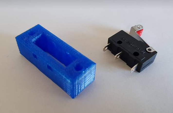 Microswitch holder