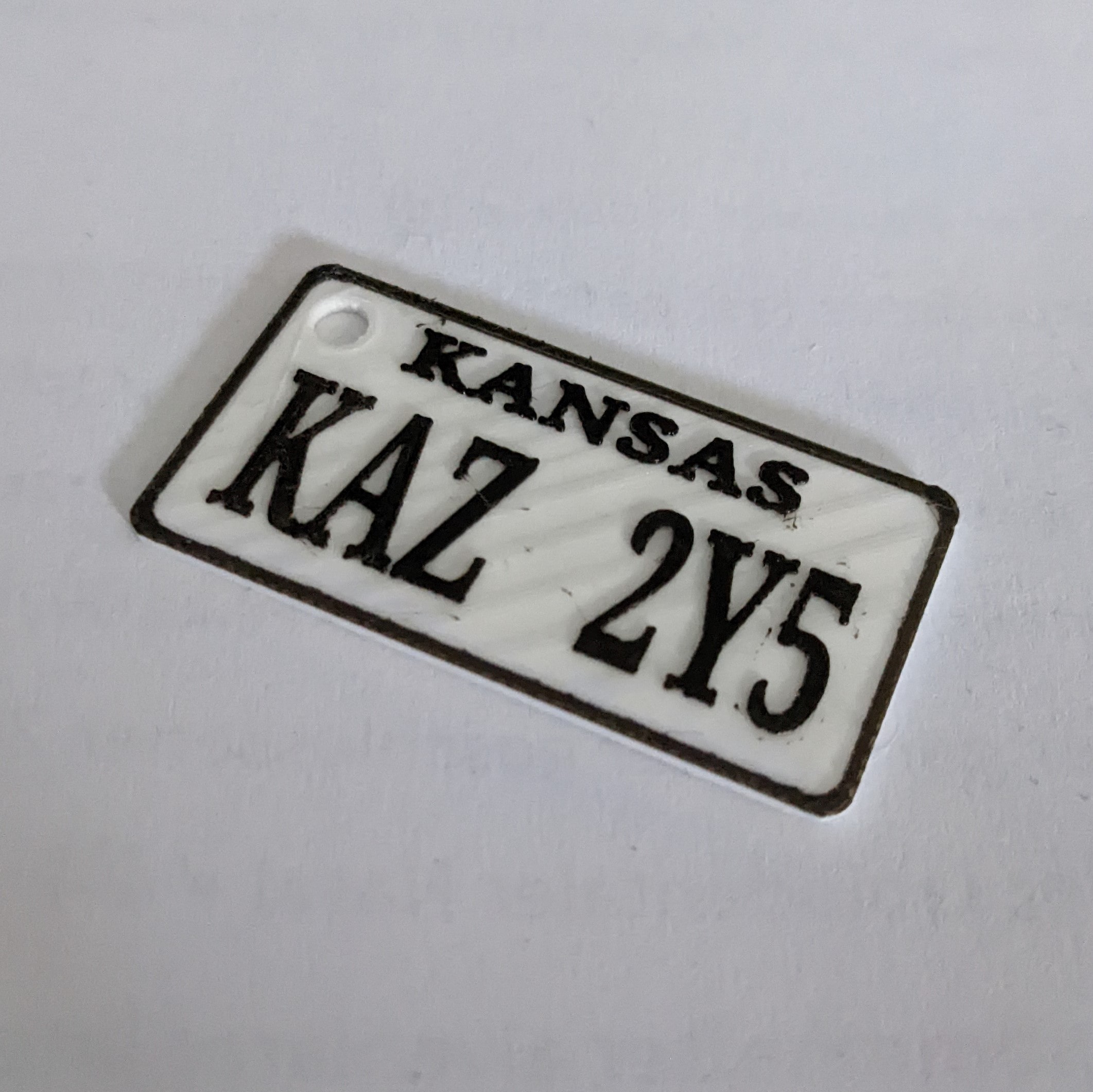 SPN Baby Numberplate Keychain