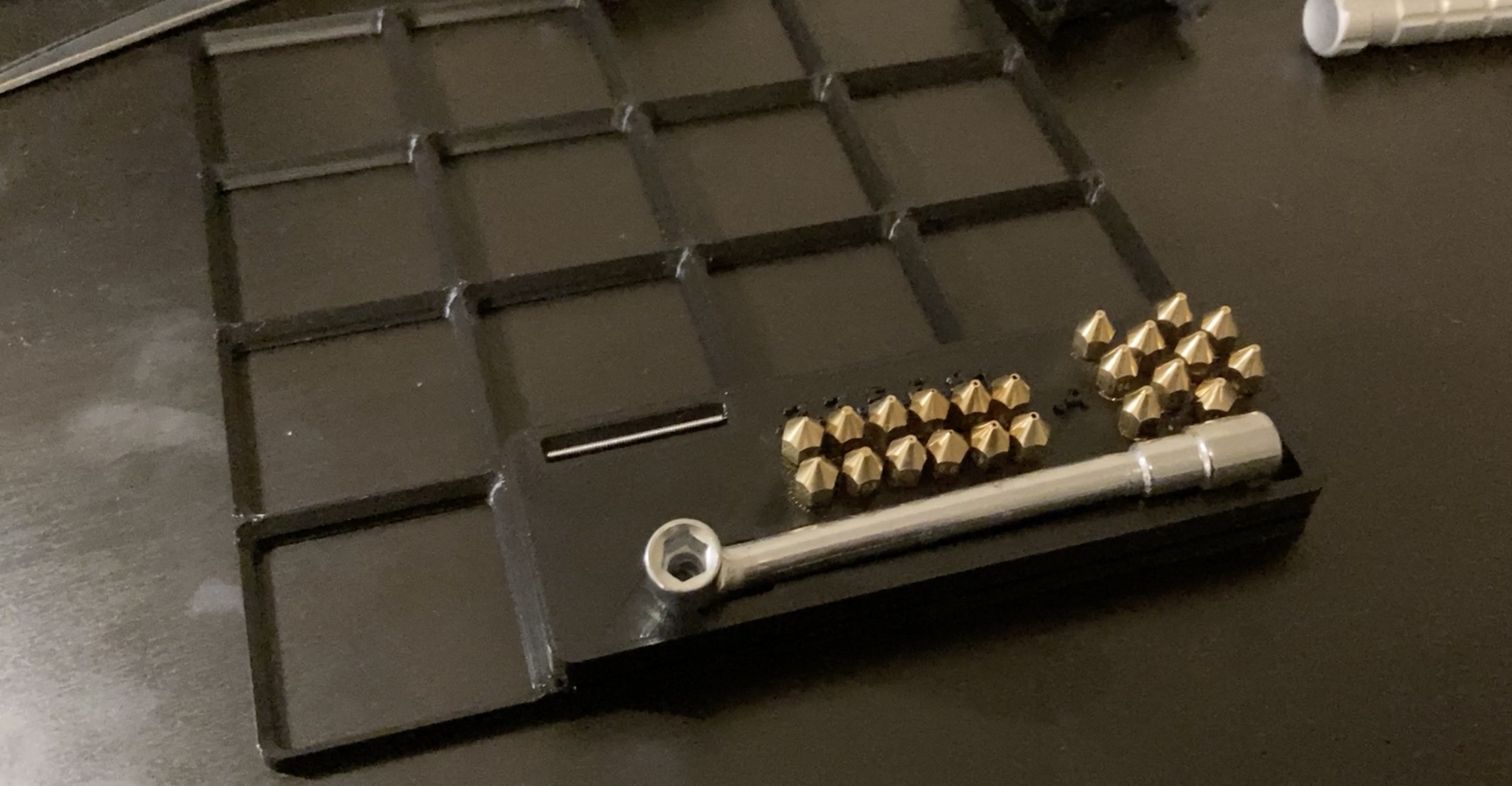 Nozzle holder for gridfinity