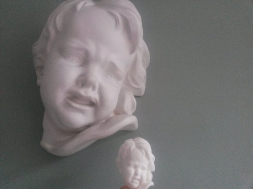 Crying angel head