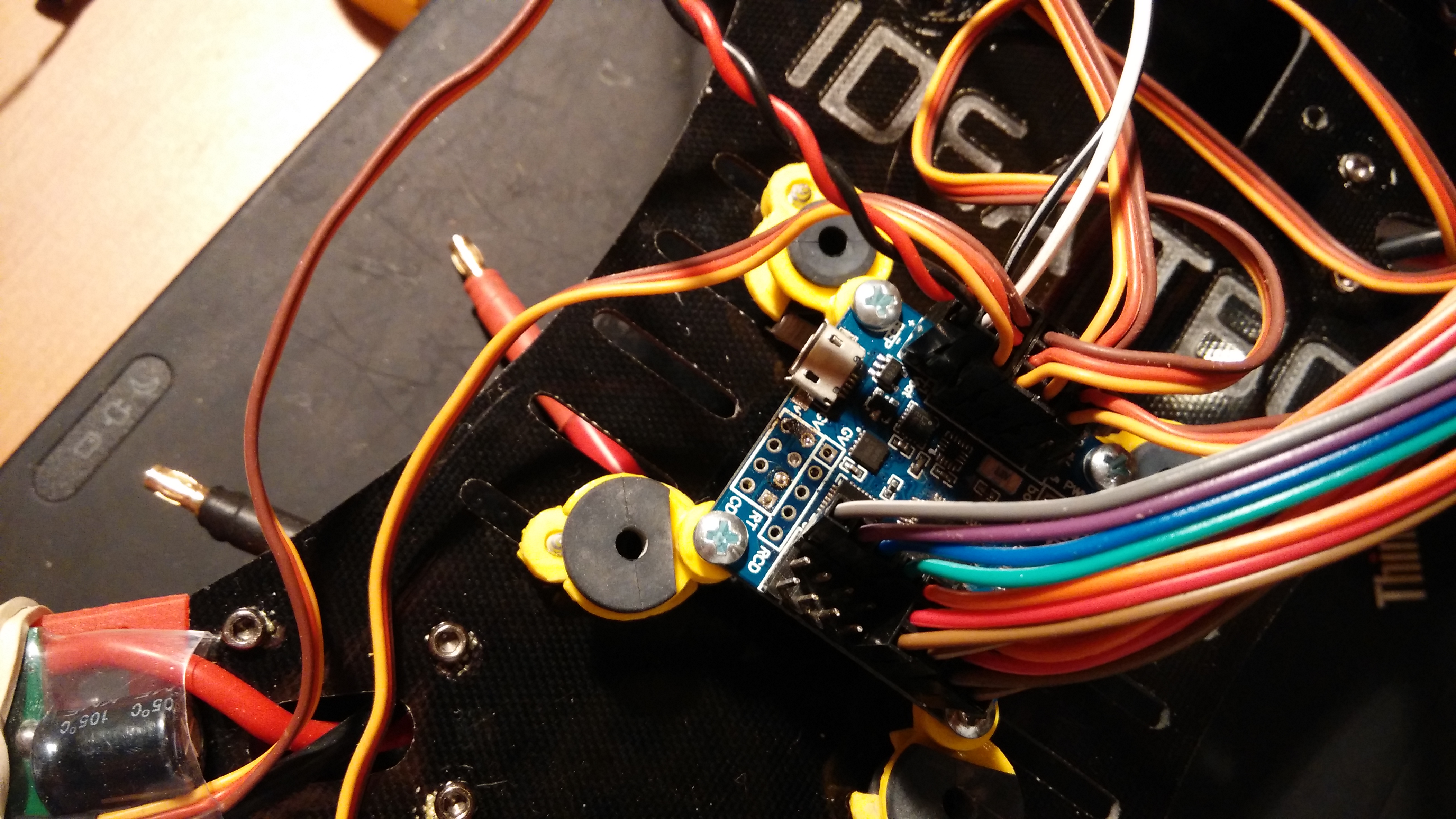 Universal CDROM rubber suspension holder for quadrocopter.