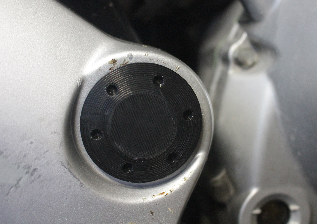Swingarm plug for Honda Varadero 125