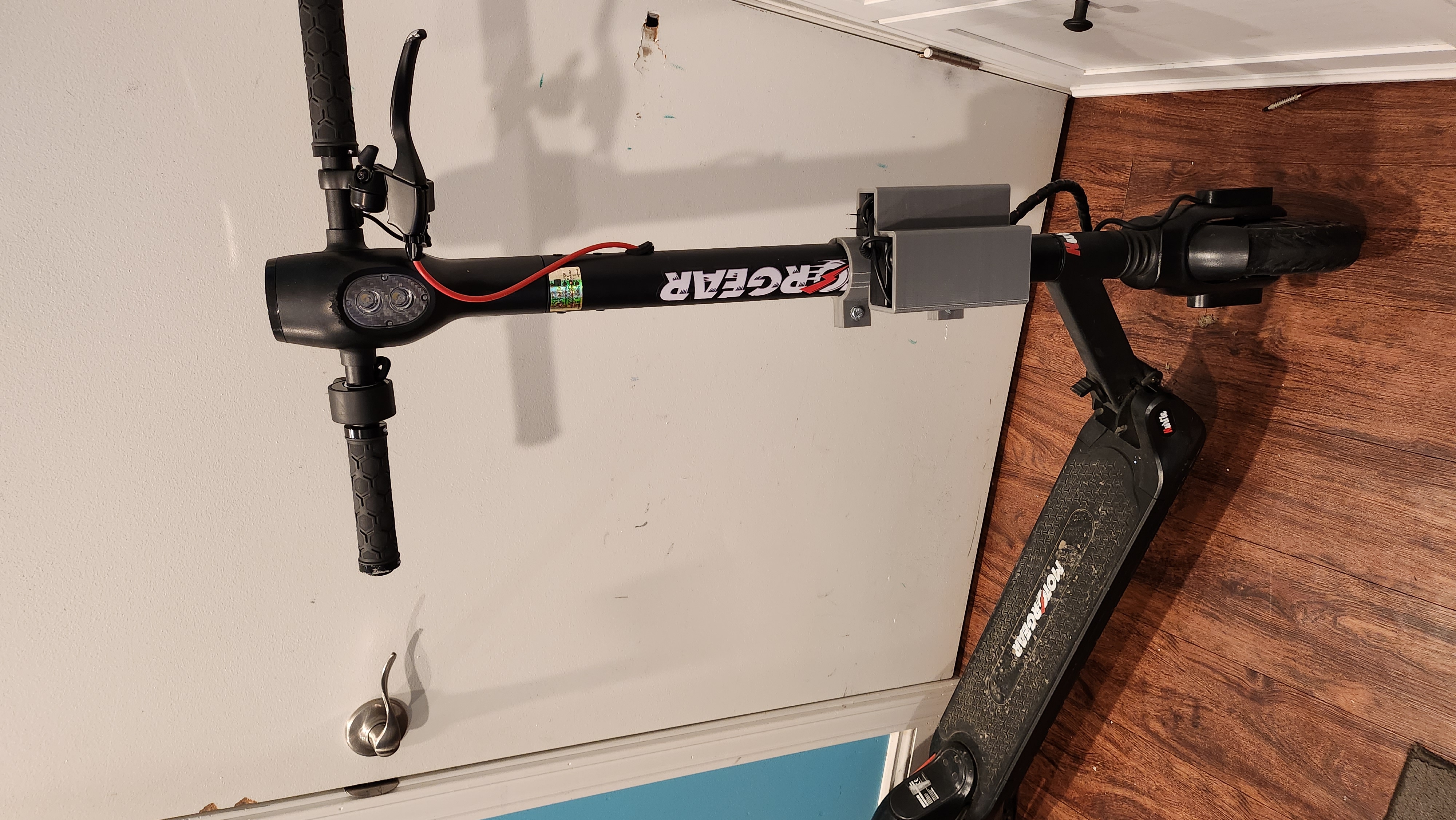 Motorgear Hustle electric scooter charger holder