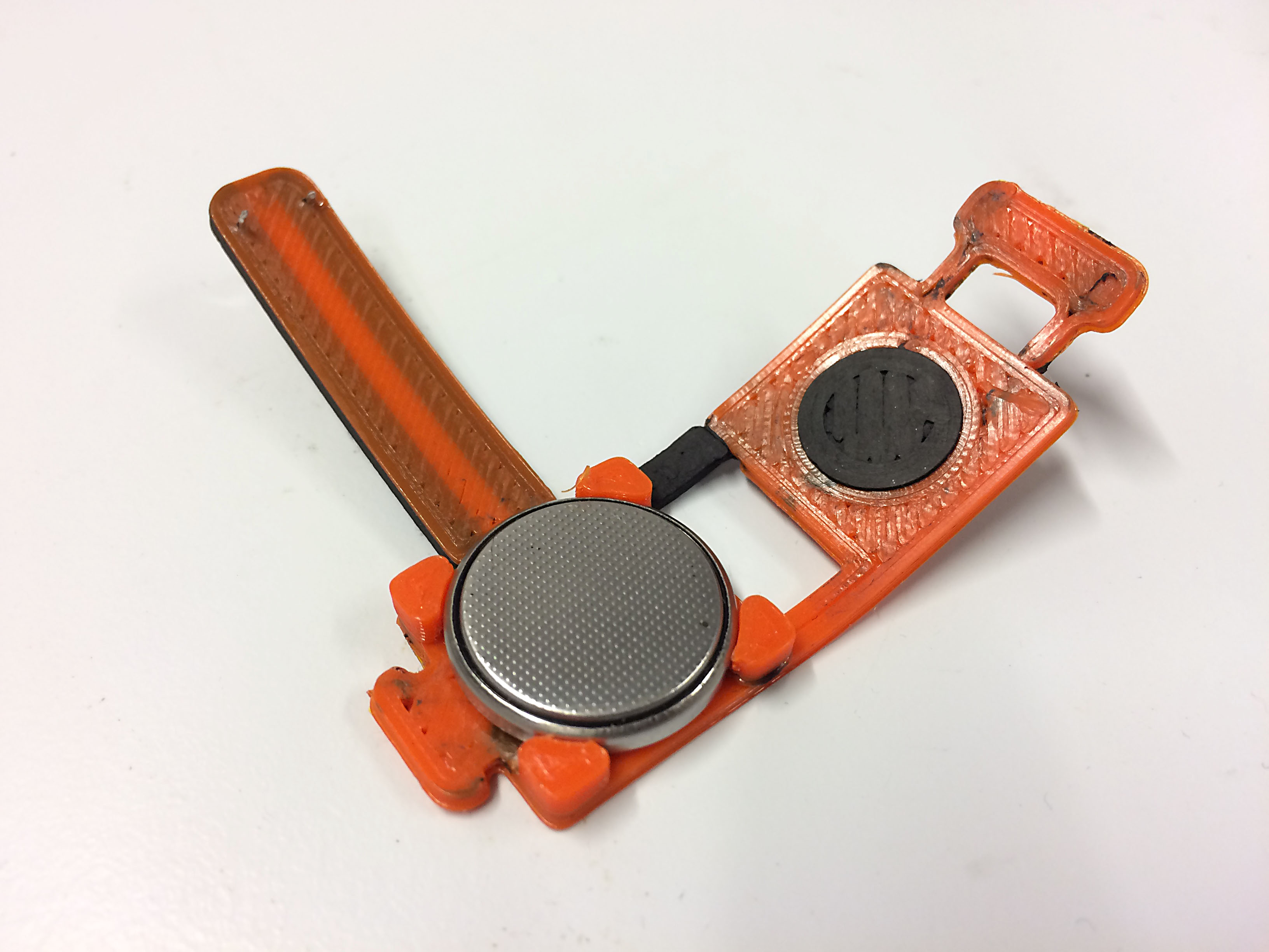 Flexible conductive filament demo "The CR2032 tester"