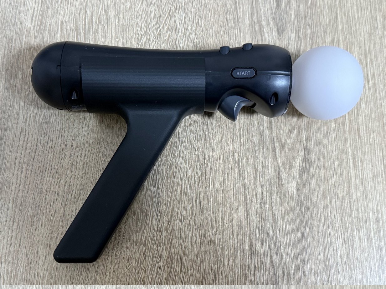 PSMove attachment for rail shooter