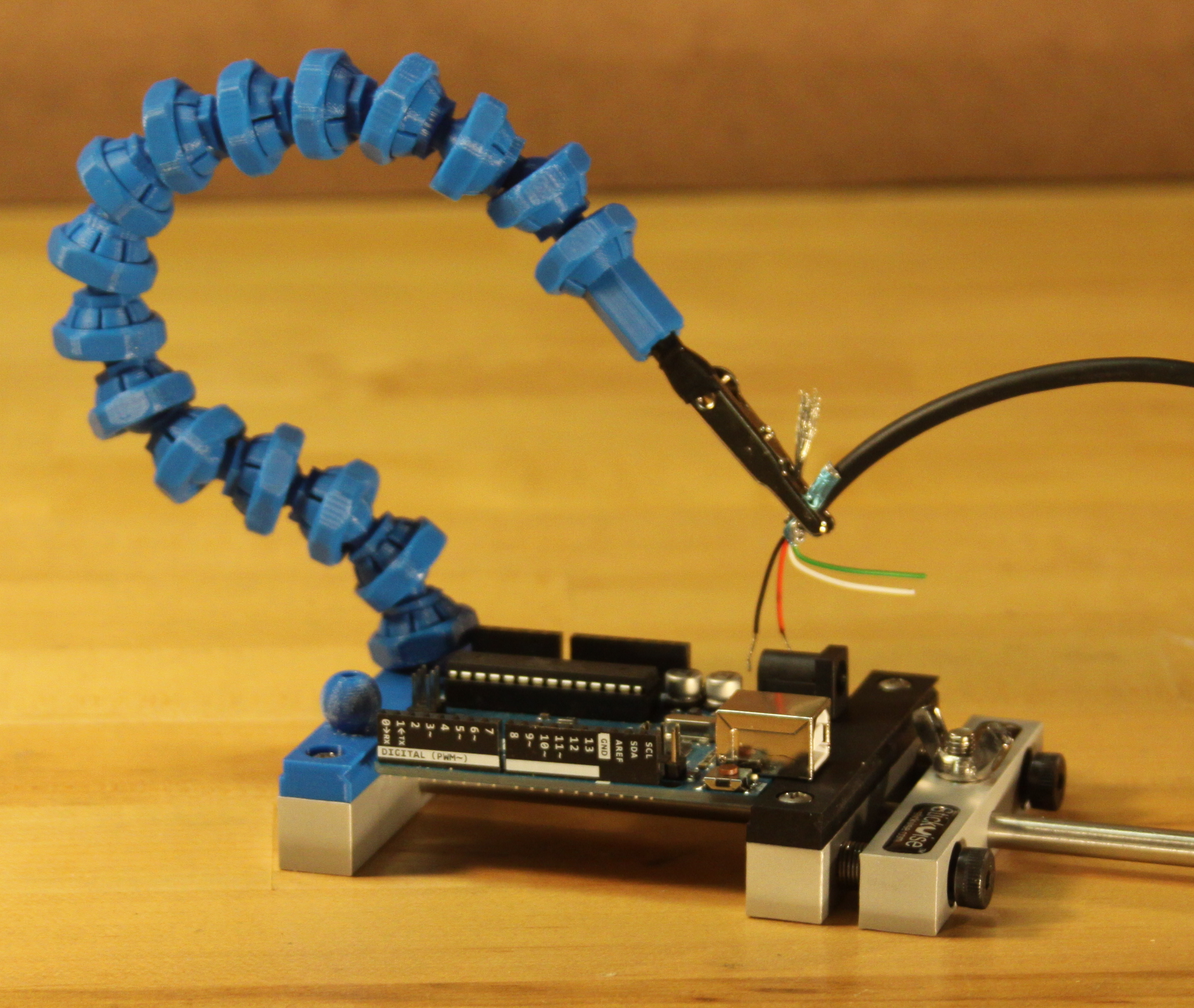 Locking ball and socket arm