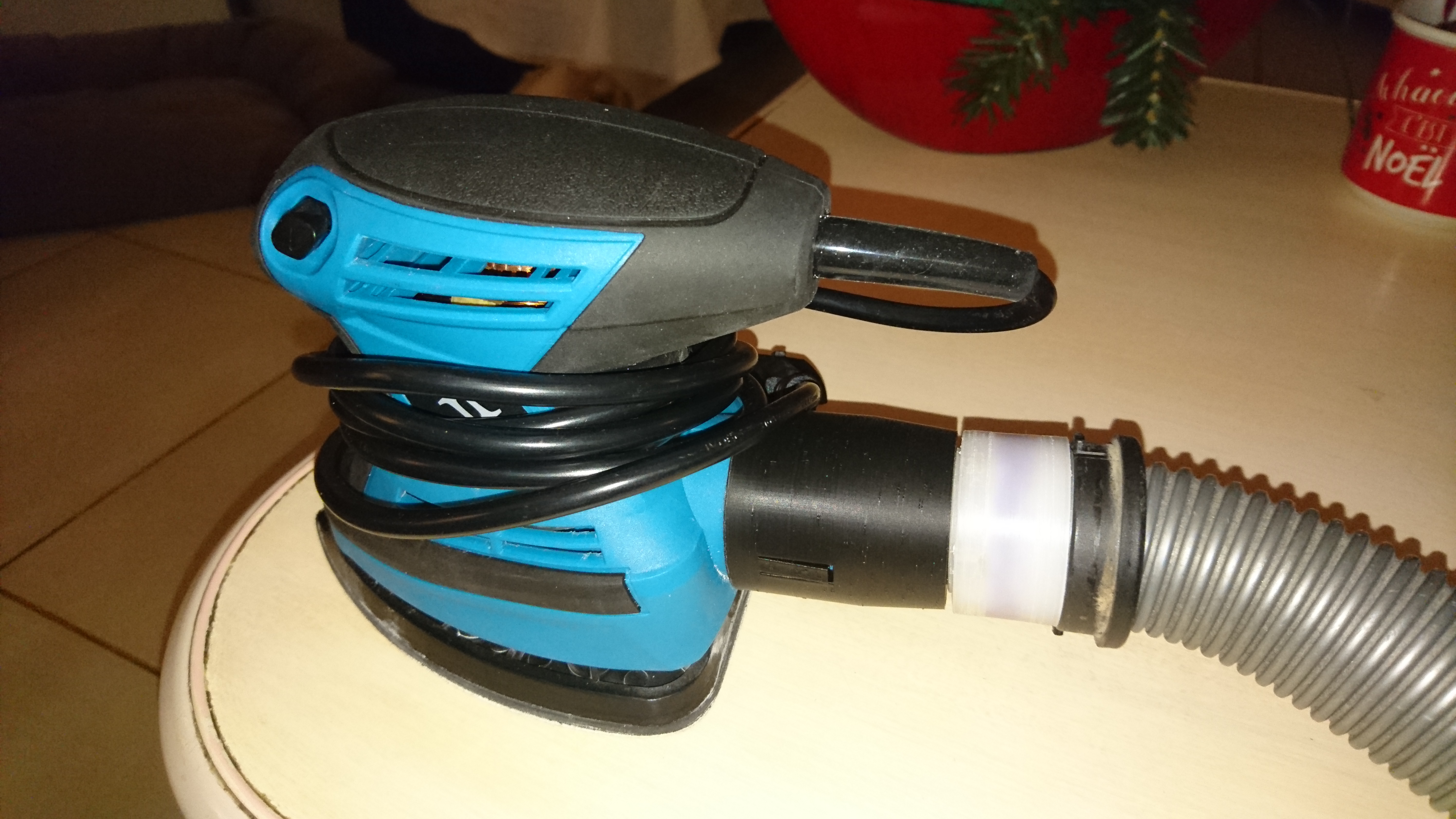 Raccord ponceuse / aspirateur