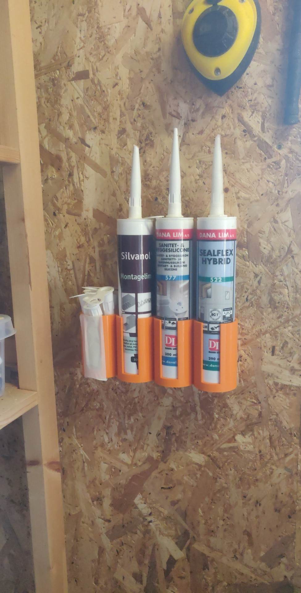 Sealant tube holder wall mount