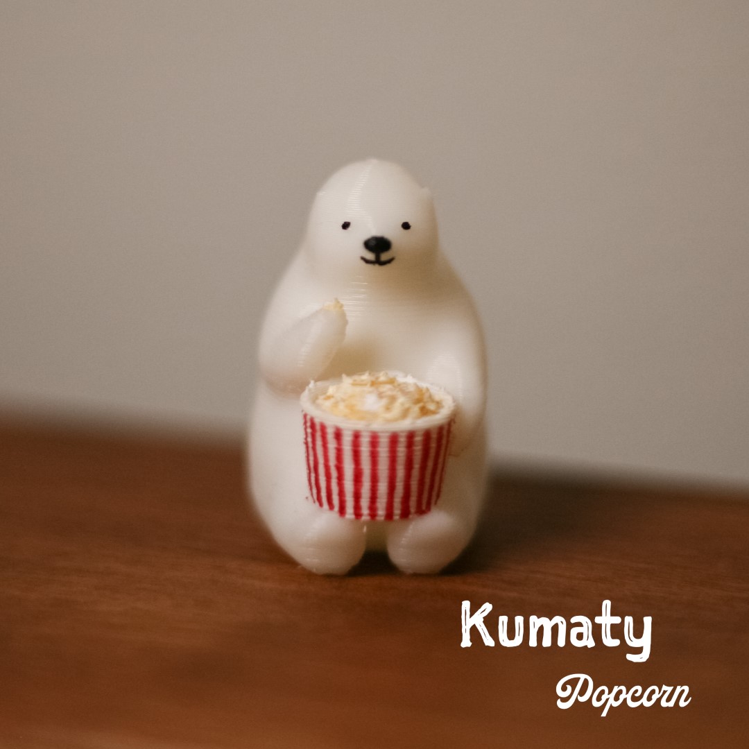 KUMATY : Polar Bear Eating Popcorn
