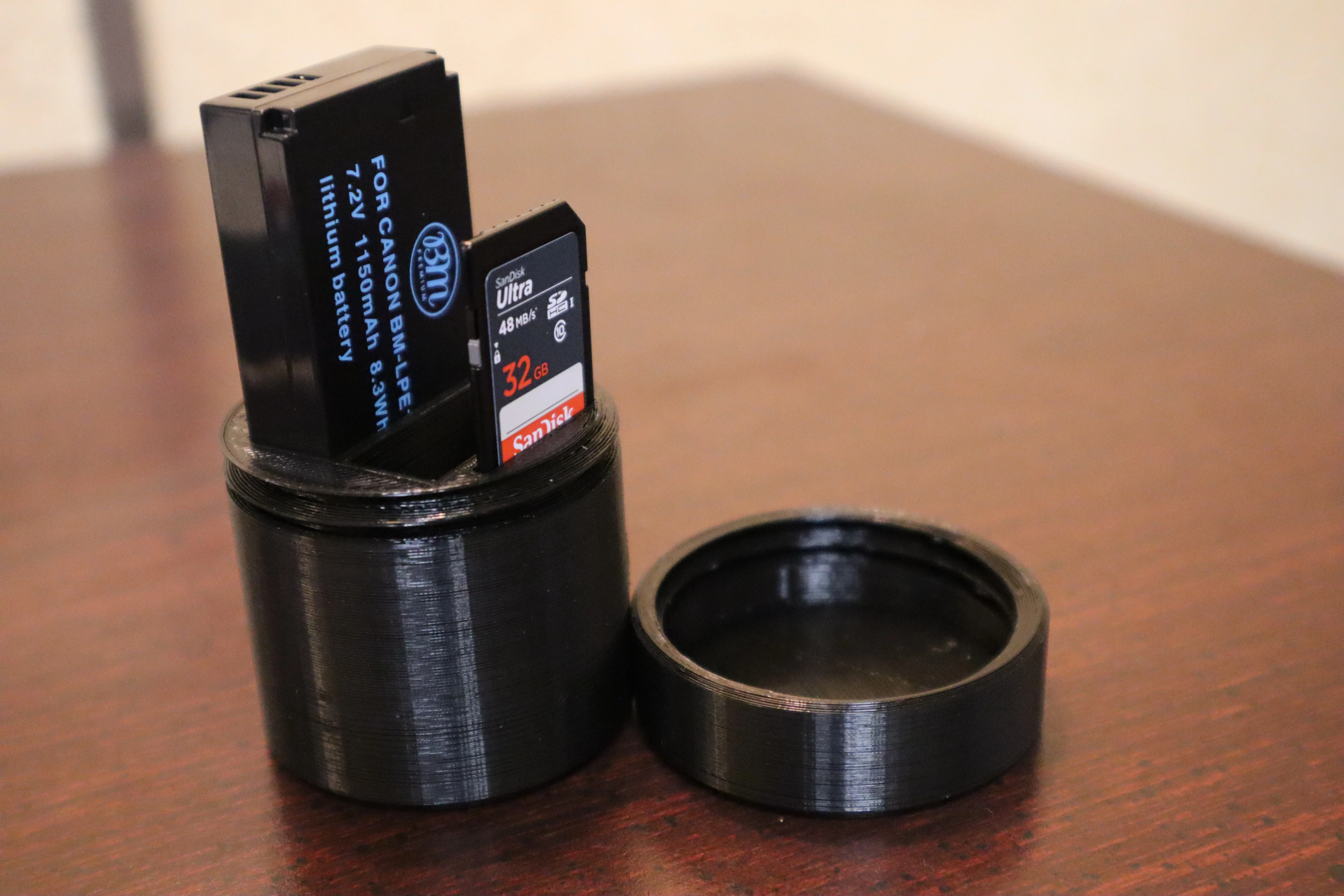 Canon camera battery box and sd card holder