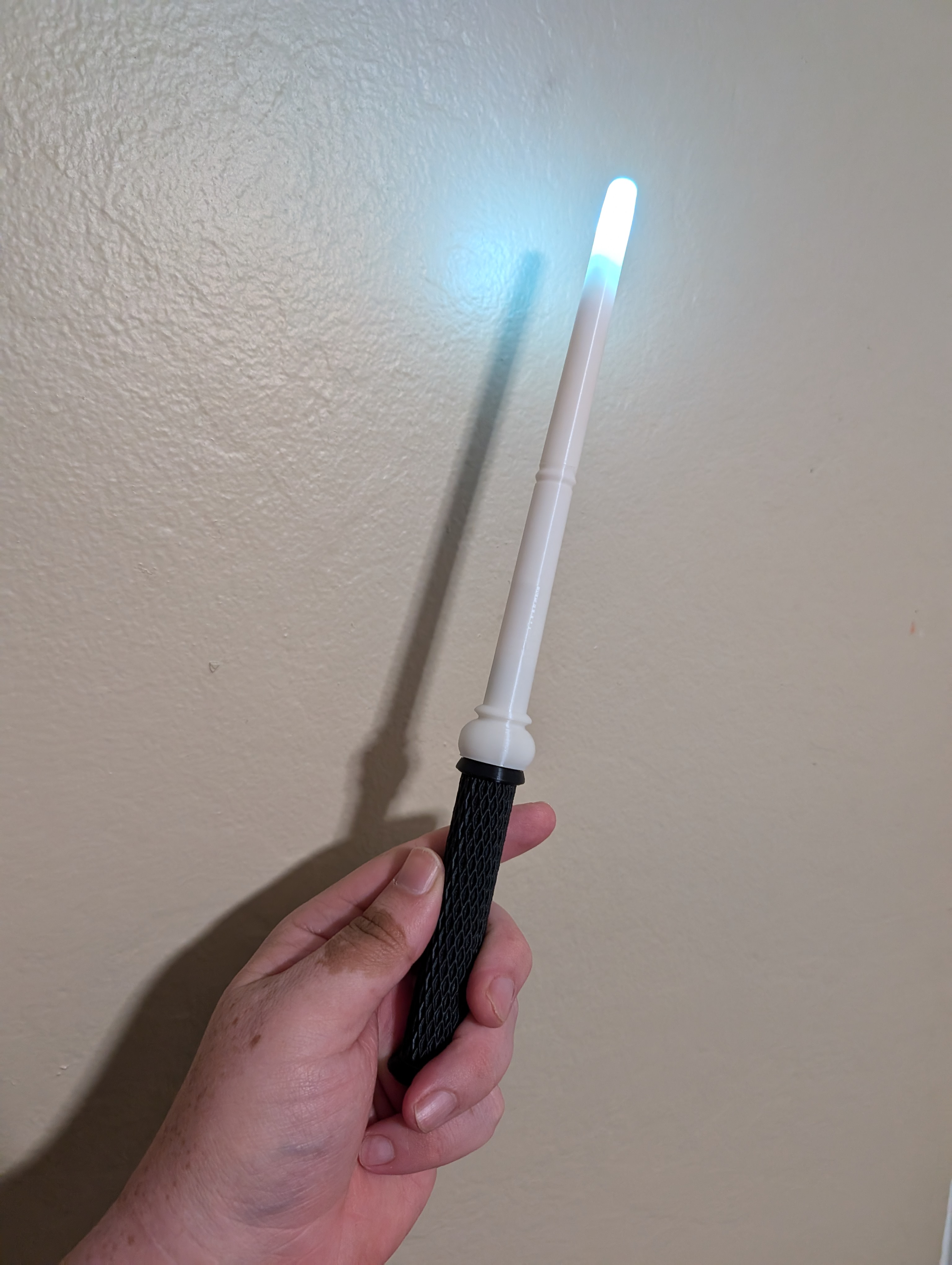 Motion-activated LED wand variant