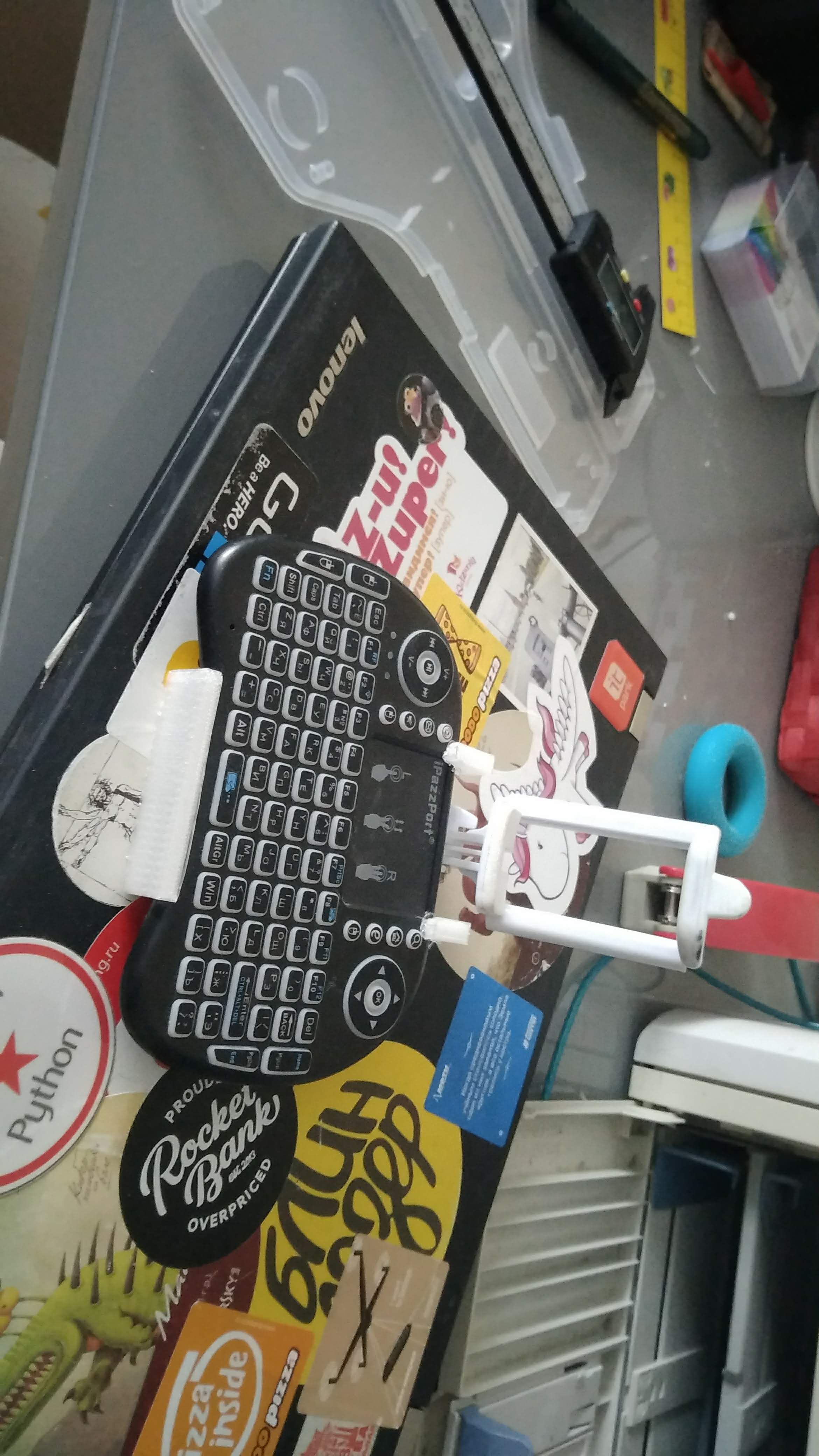 Holder for phone keyboard