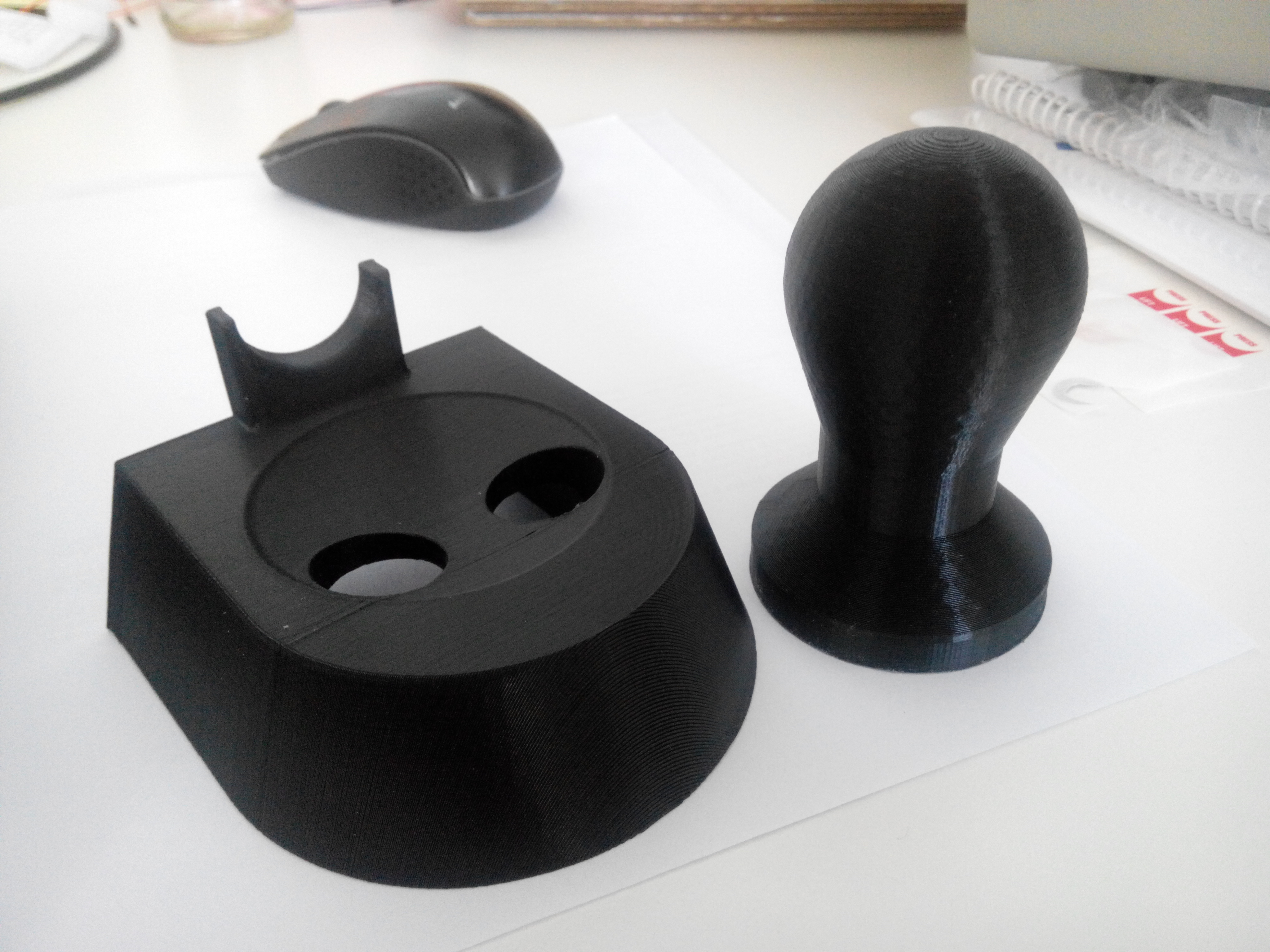 Delonghi tamper and tamper stand