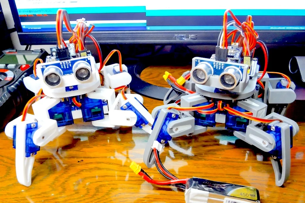 Arduino controlled 2-joint 8-servo 4-legged Walking Robot