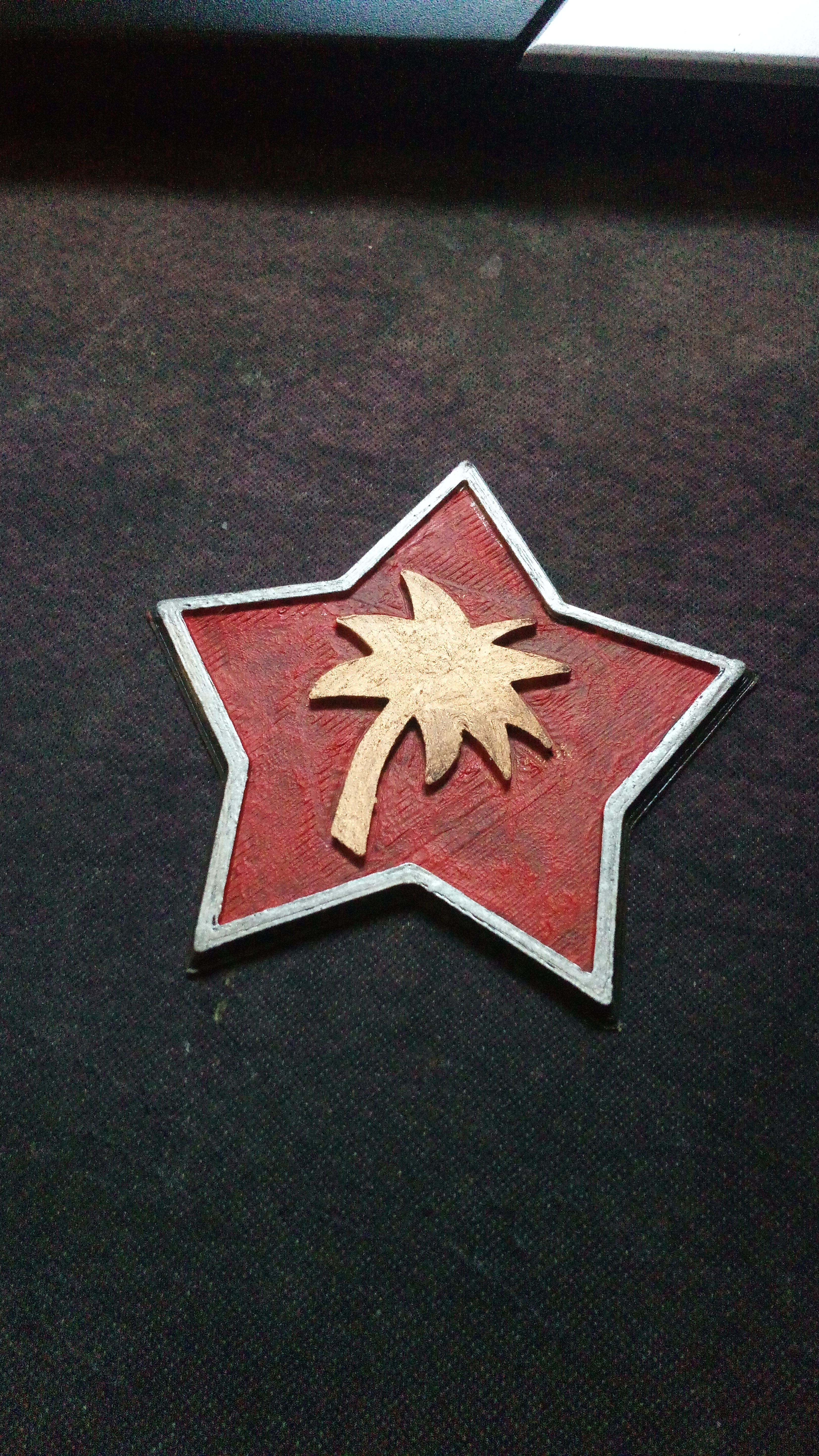 Tropico badge