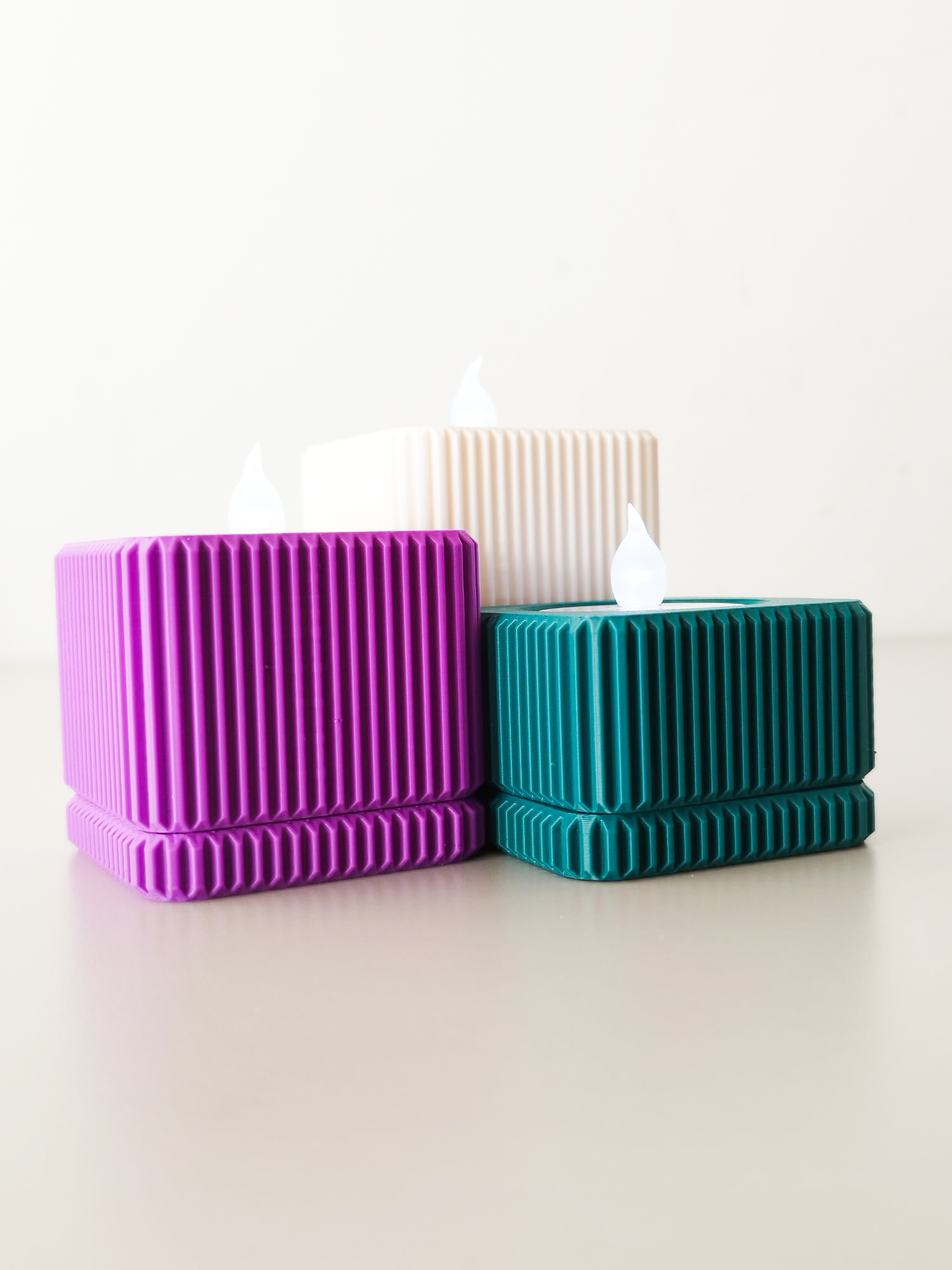 Textured square candle holder.