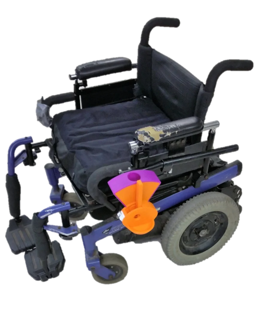 Wheelchair-Mounted Dog Treat Dispenser