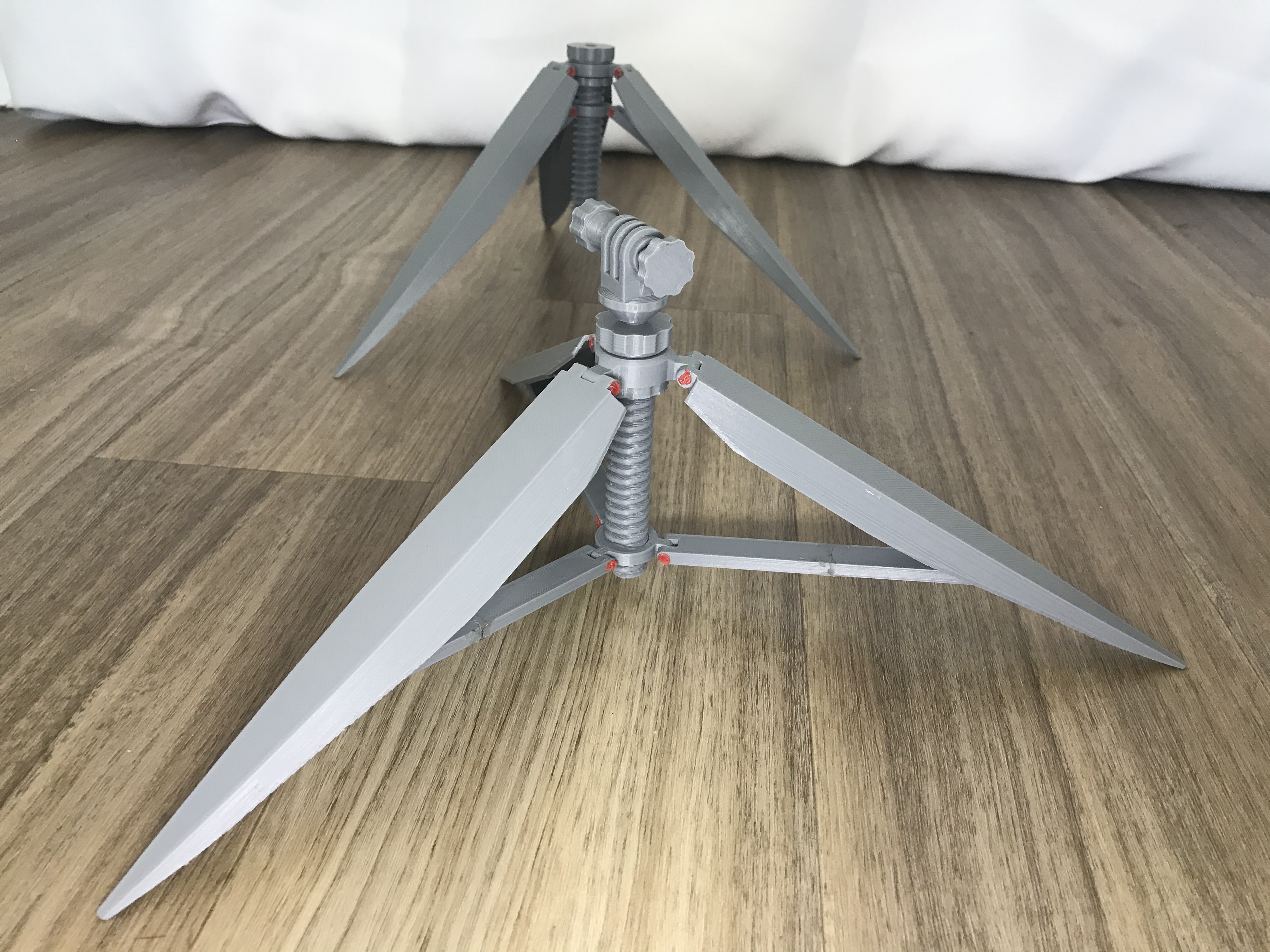An 8 inches Universal Tripod (for action camera and phone and etc.)