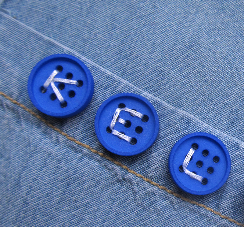 5/8" Nine-Hole Alphabet Buttons (2)