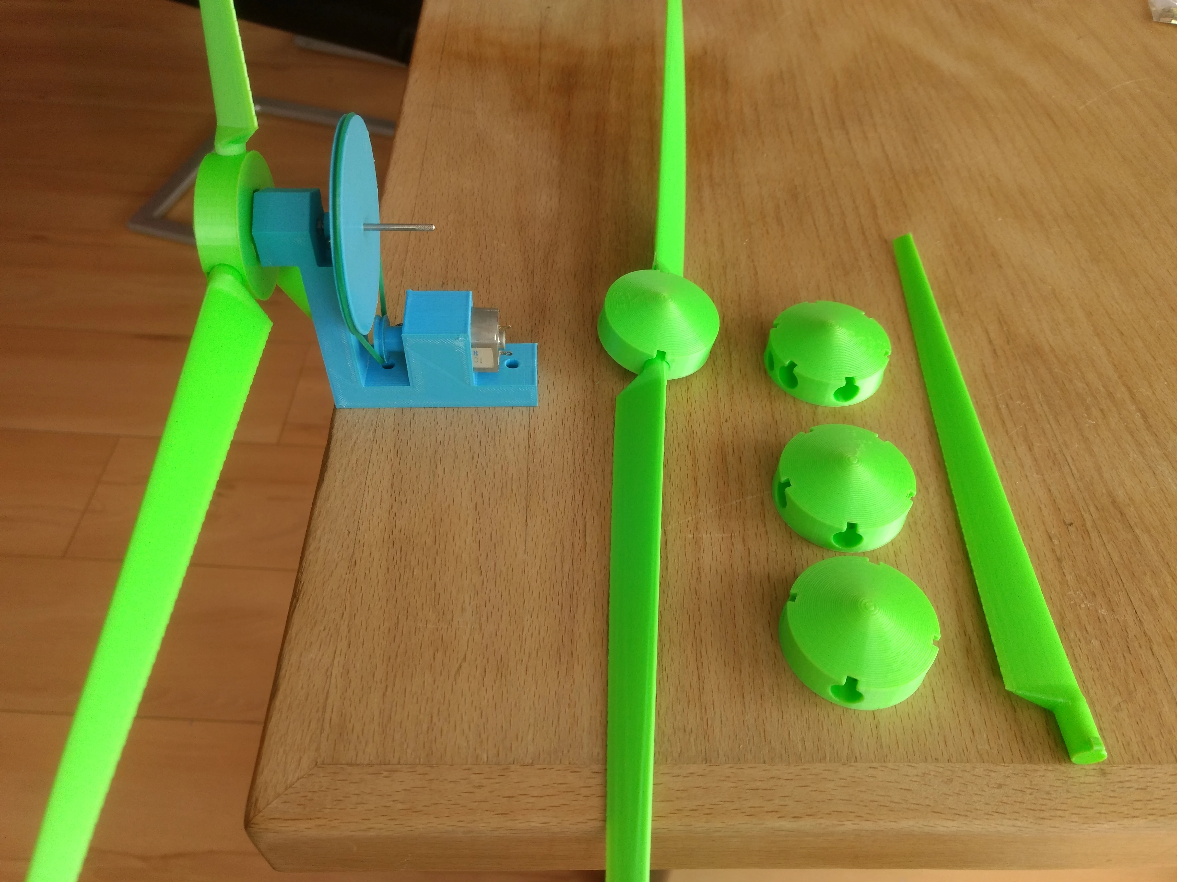 Wind turbine, experiment on the effect of the number of rotor blades and their angle of attack on the performance.