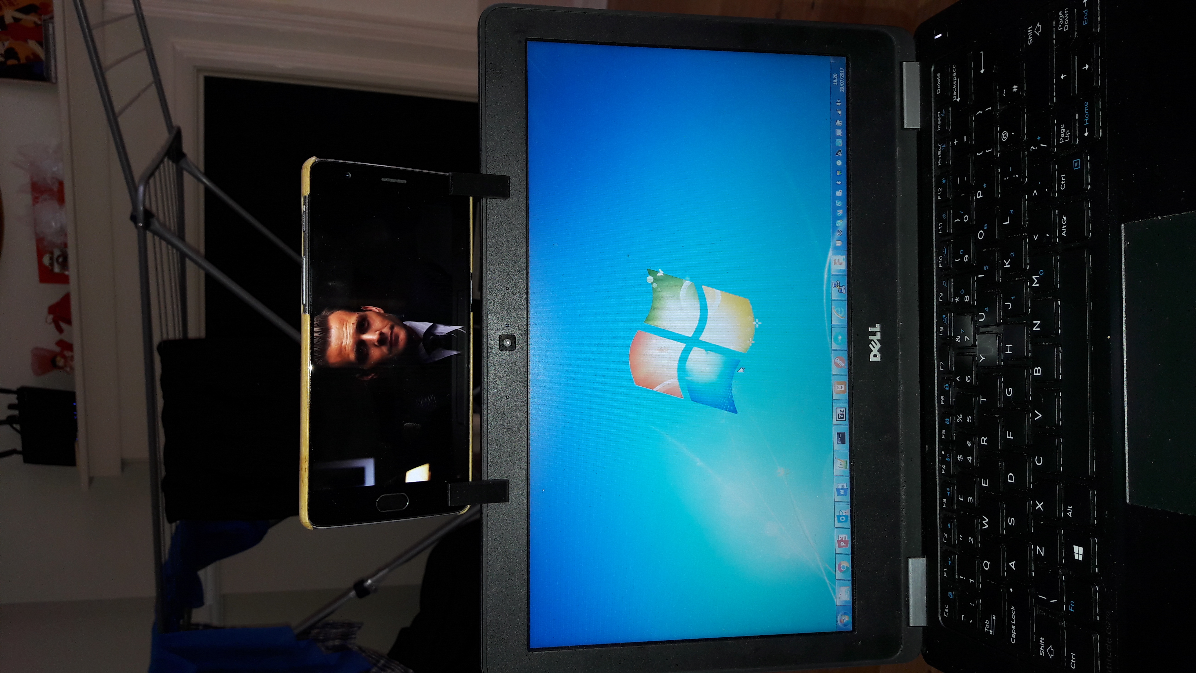 Phone holder on laptop