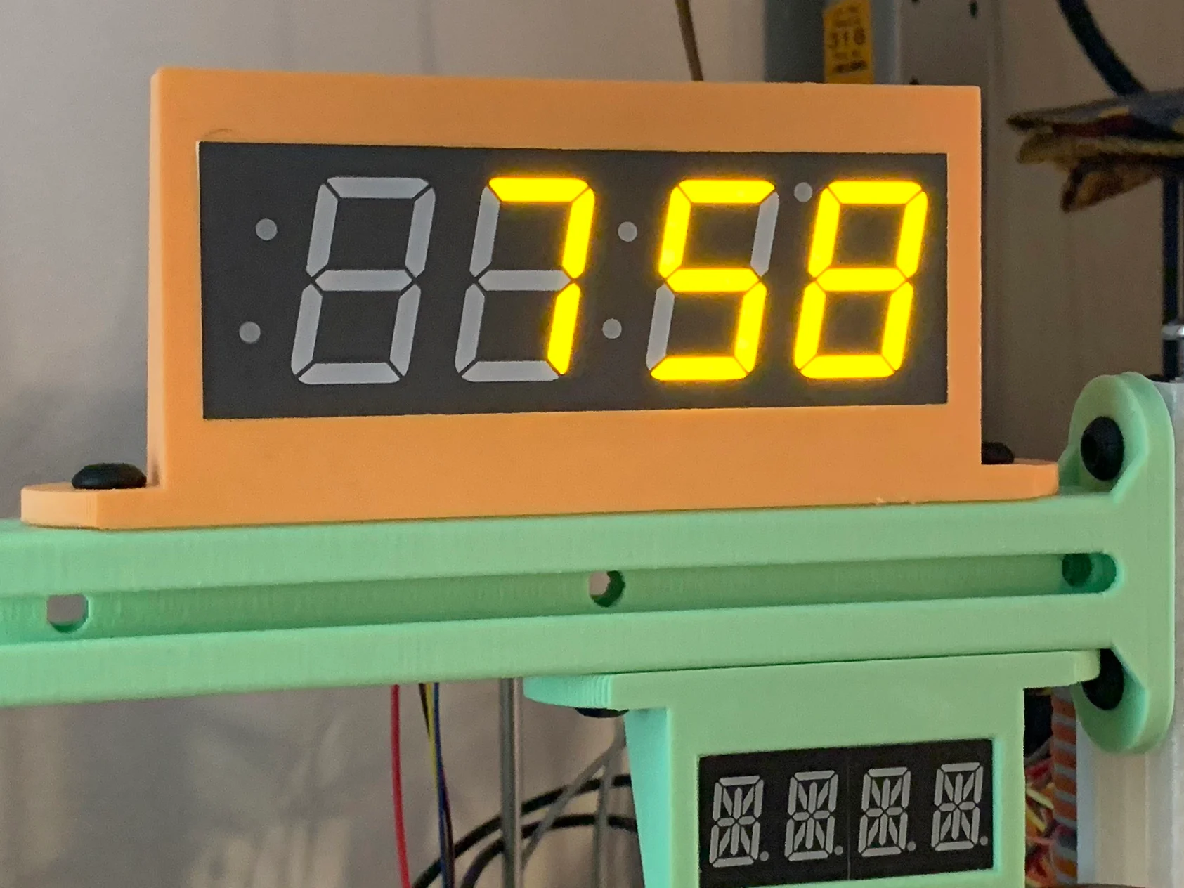 Display holder for an Adafruit 1.2" 4-Digit 14-Segment Display w/I2C Backpack