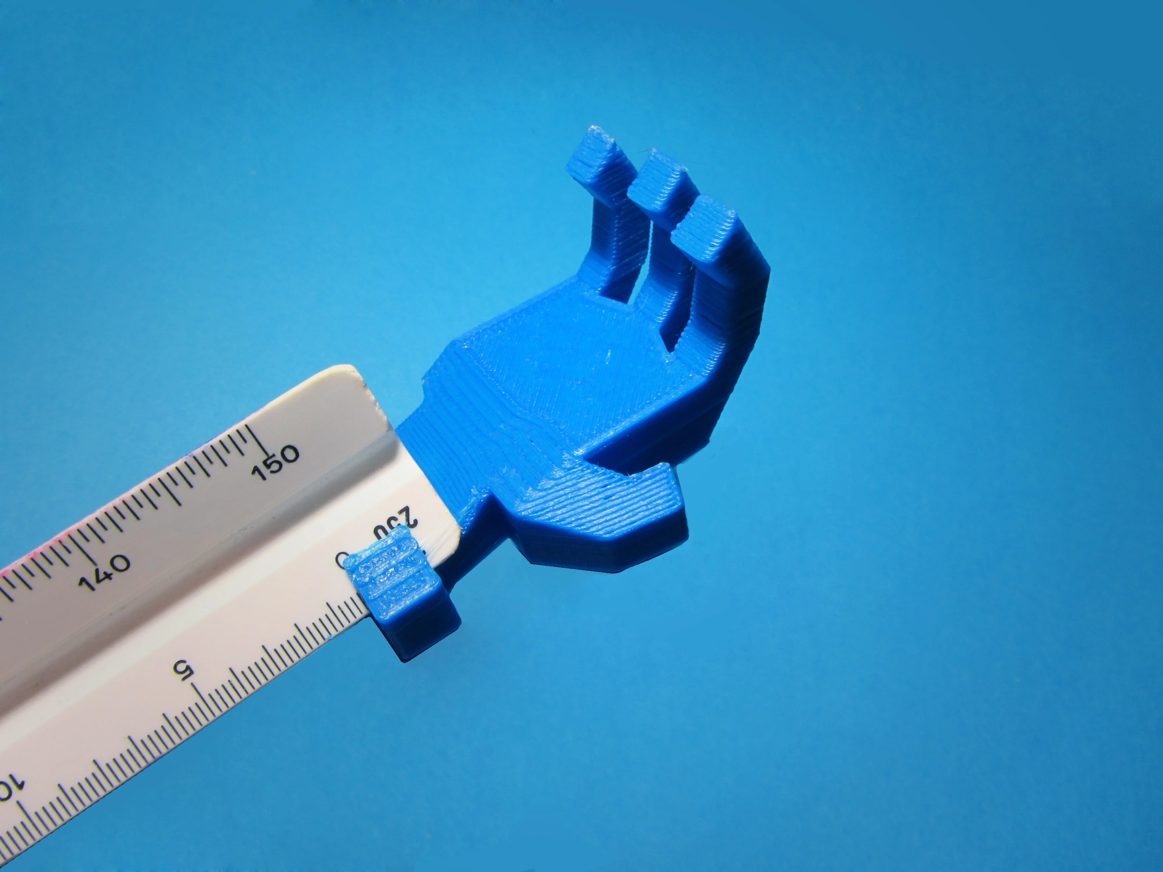Backscratcher attachment for reduction scale ruler