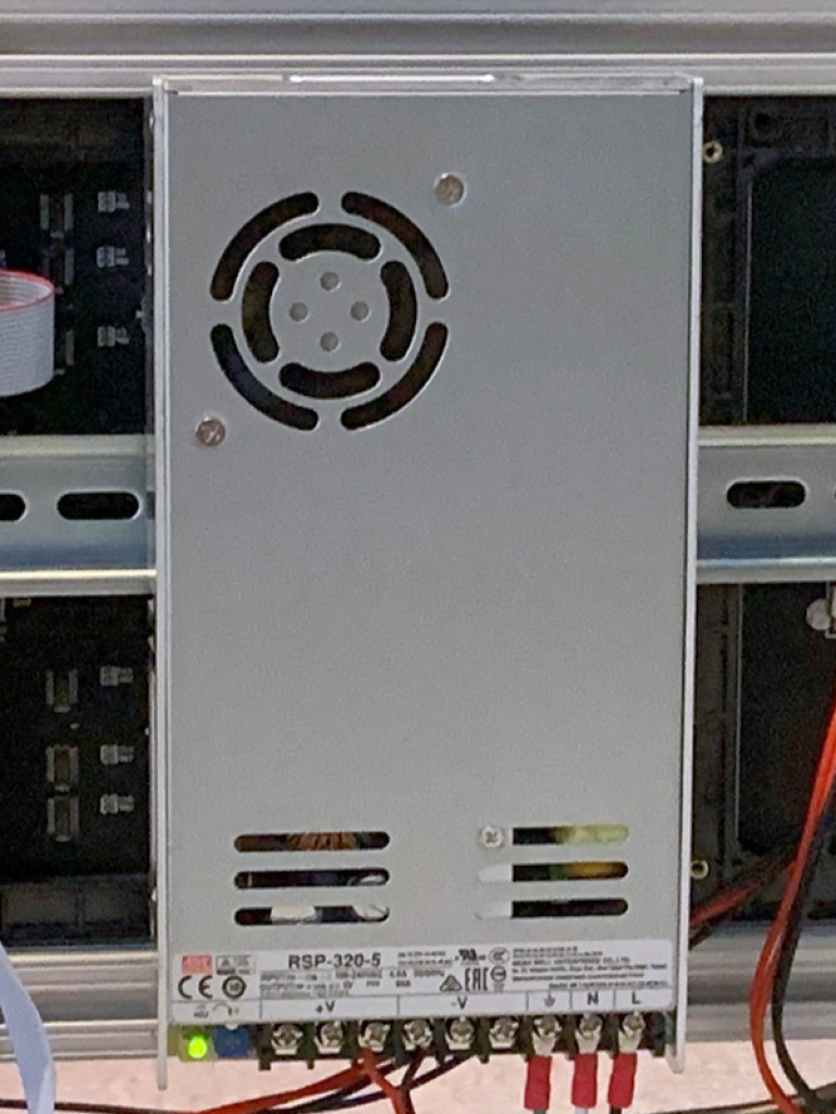 Mount for a MeanWell RSP-320 power supply on a DIN Rail