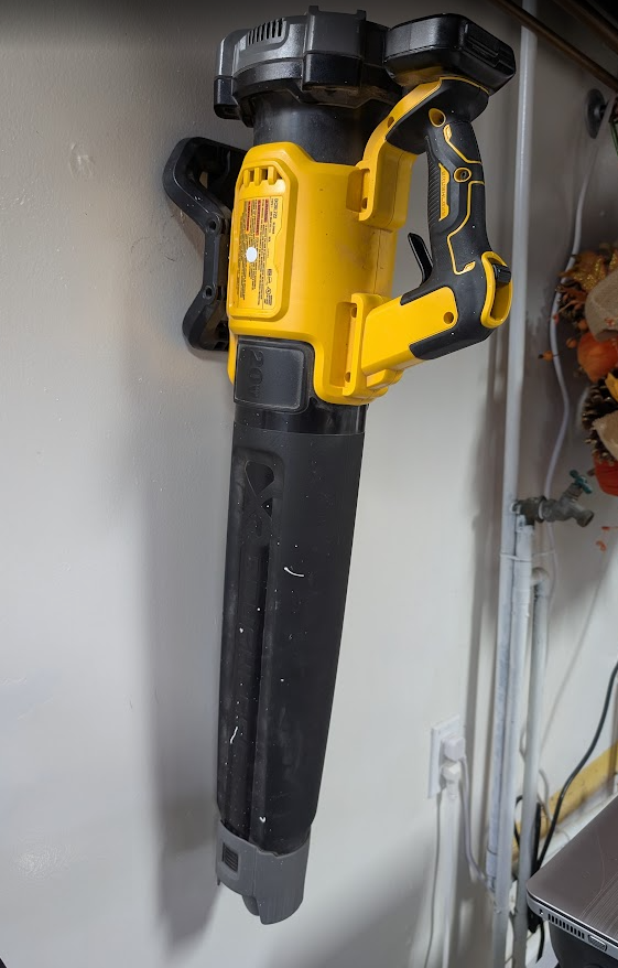 Bracket for wall mounting a dewalt DCBL722B blower