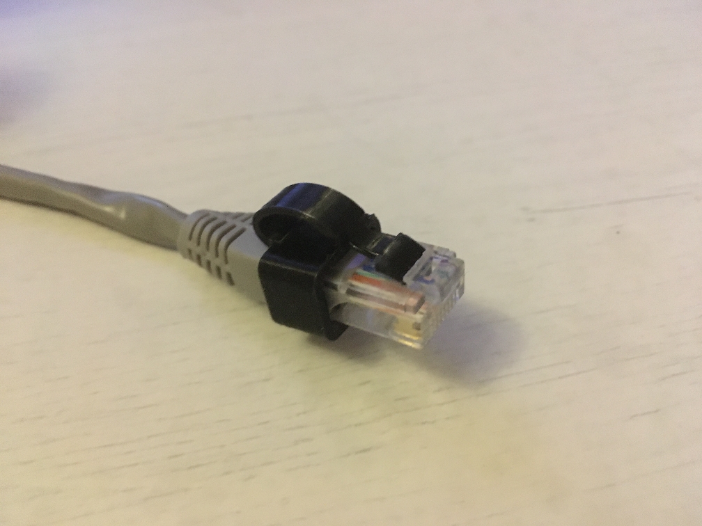 RJ45 replacement clip in two parts