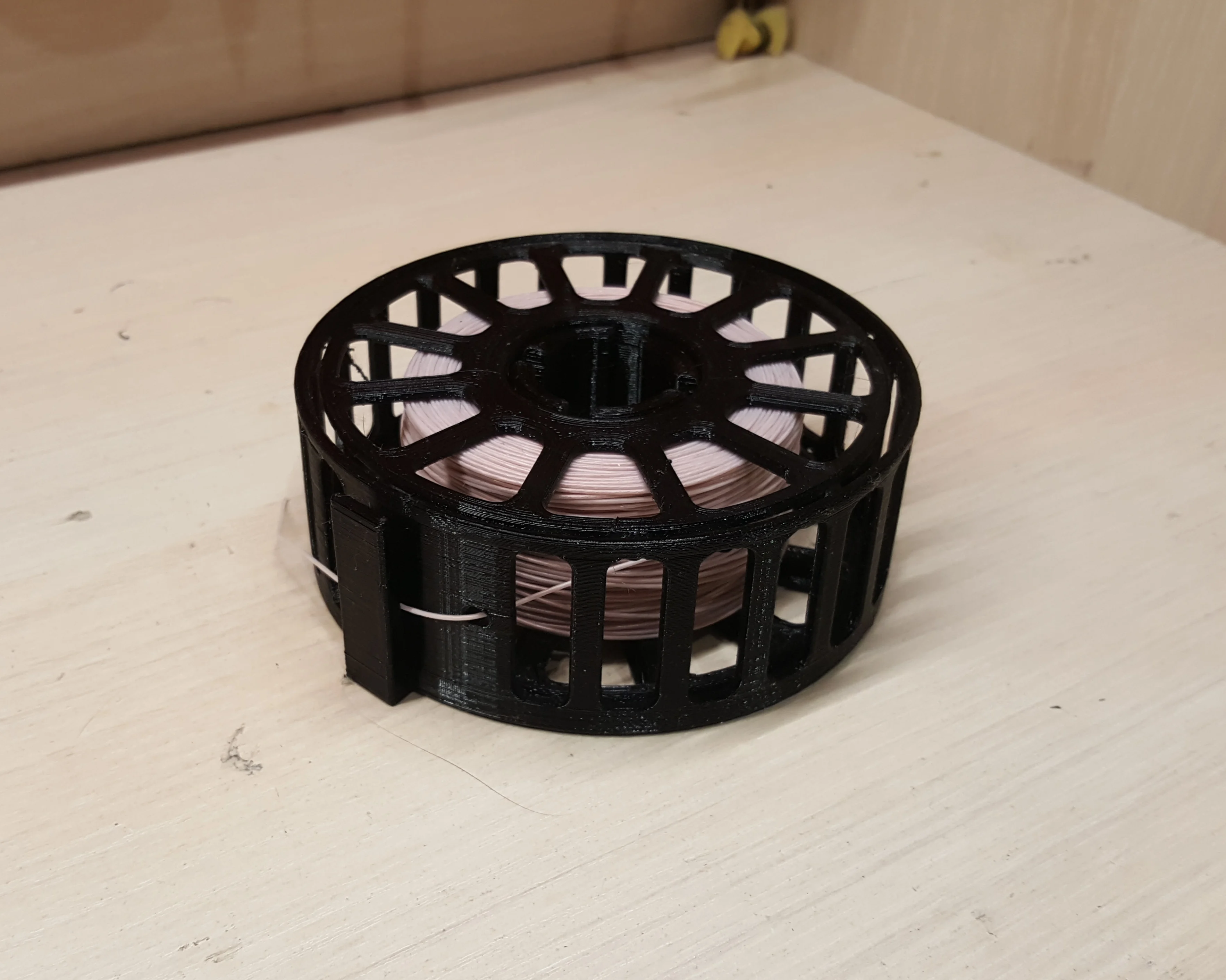 Boxed wire storage spool