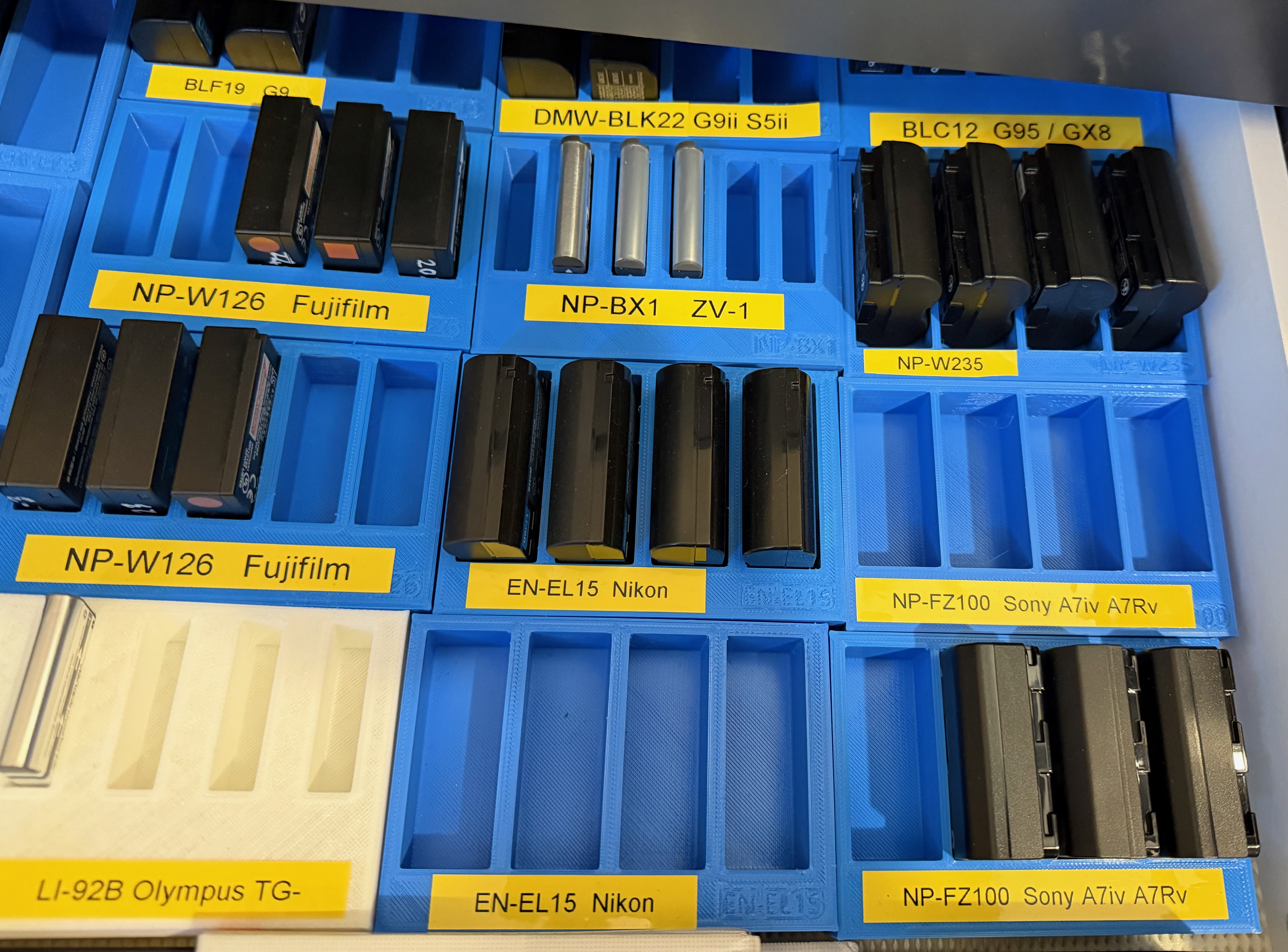 Battery trays for Panasonic, Olympus, Fuji, Nikon, Sony cameras