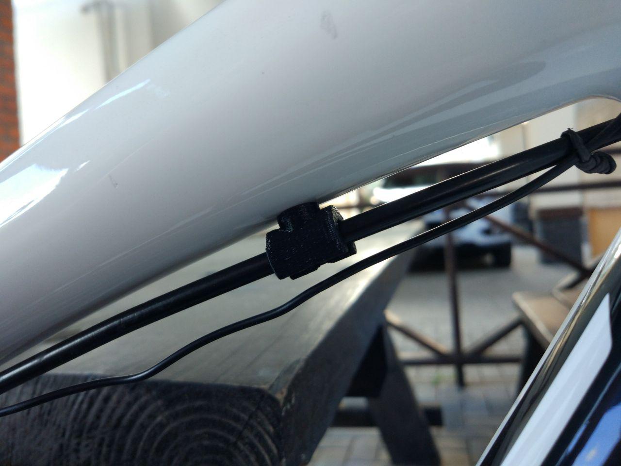 Bike brake tube clamp / cable holder