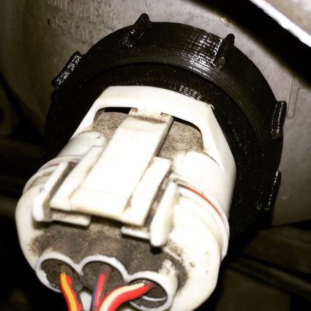 Headlight bulb retainer for 1988 Toyota Camry (and others)