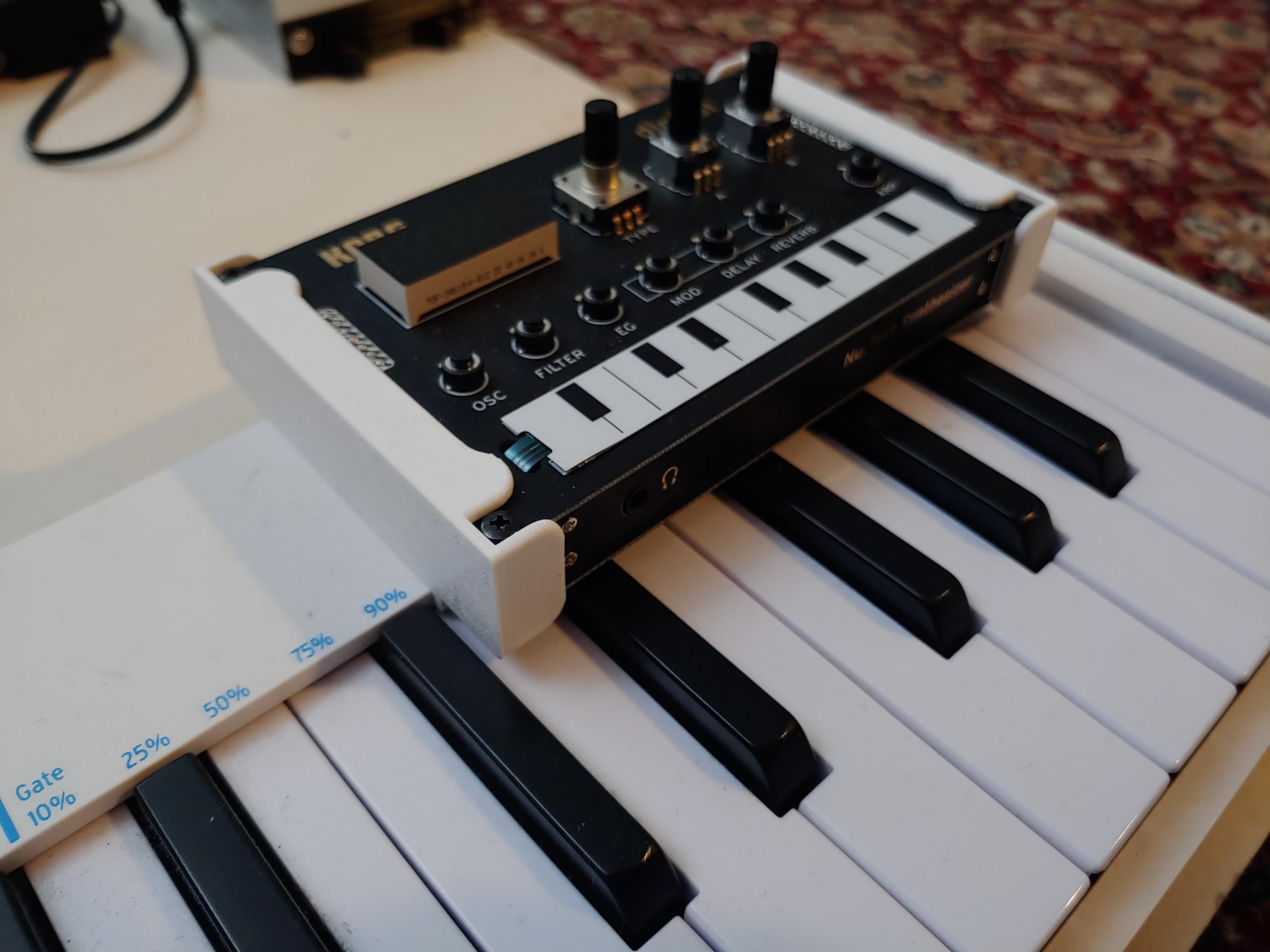Korg NTS-1 holder Aturia Keystep