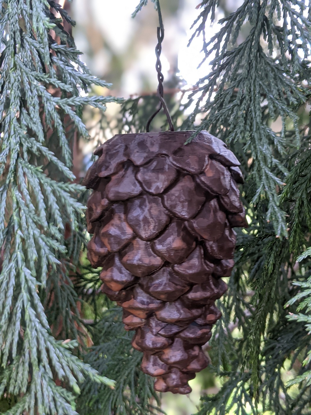 Pinecone Geocache container with attachment point