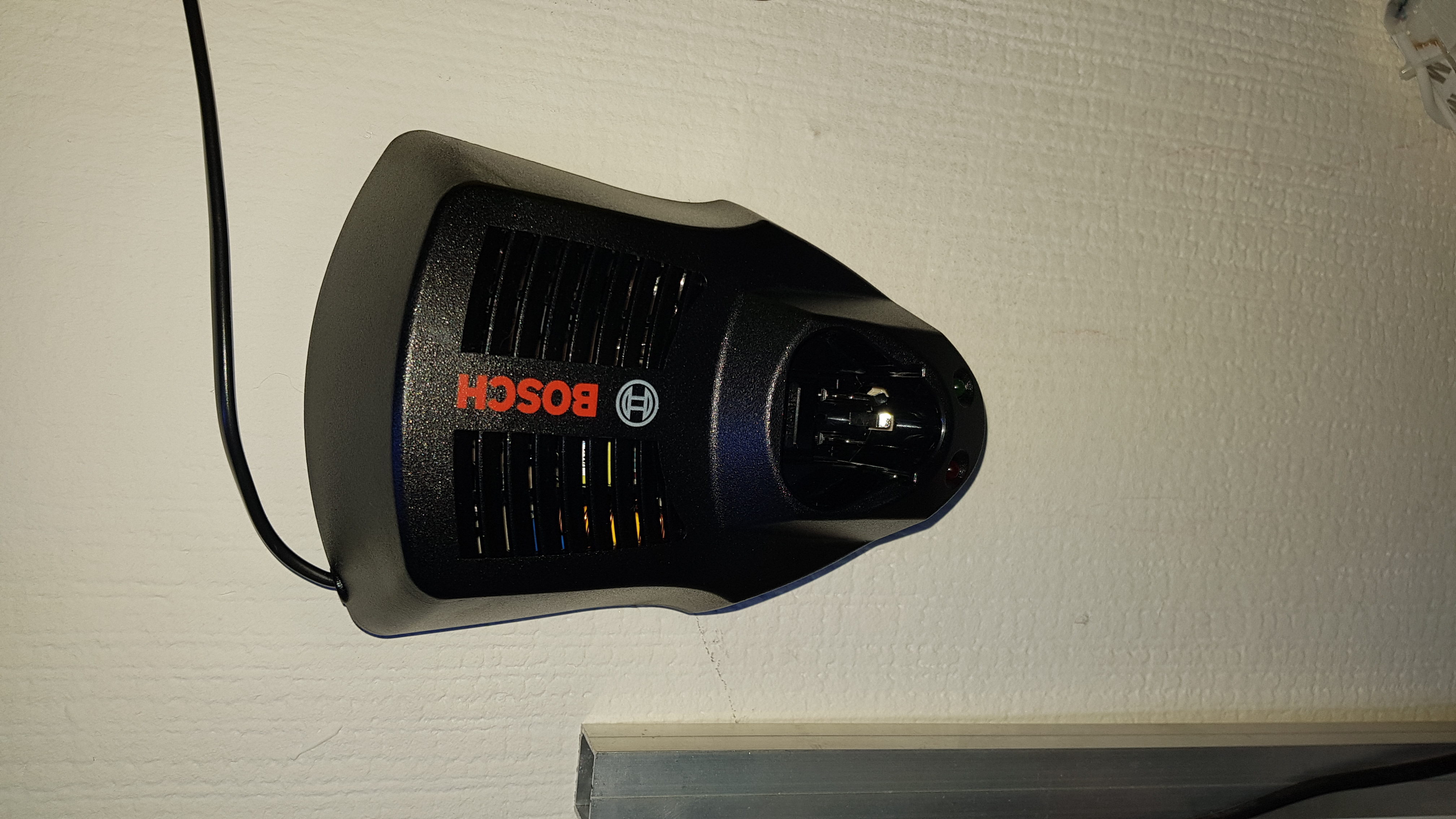 Wall mount holder for Bosch 12V Lithium charger (10.8V) GAL 1230 CV