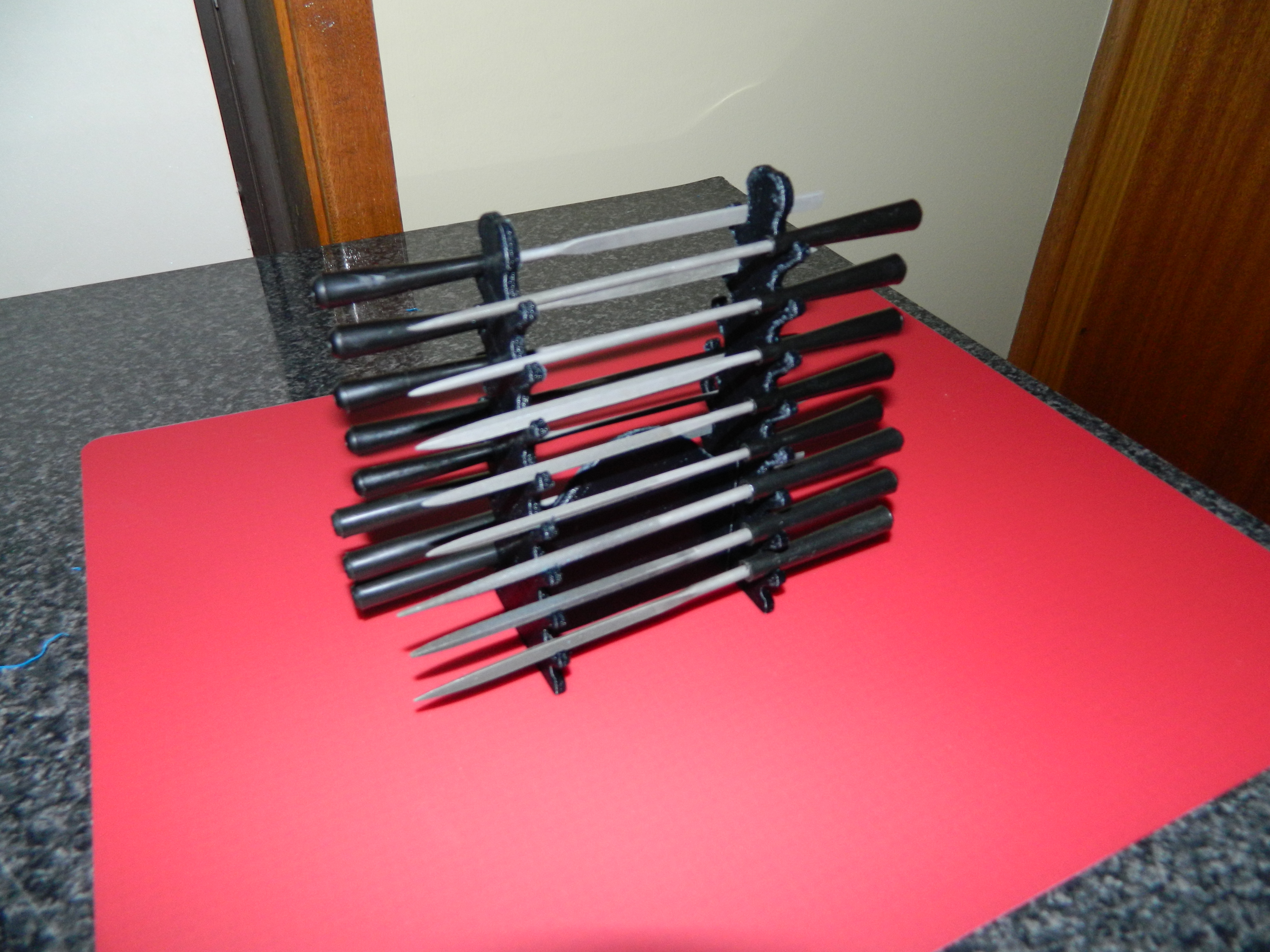 Needle file sword stand