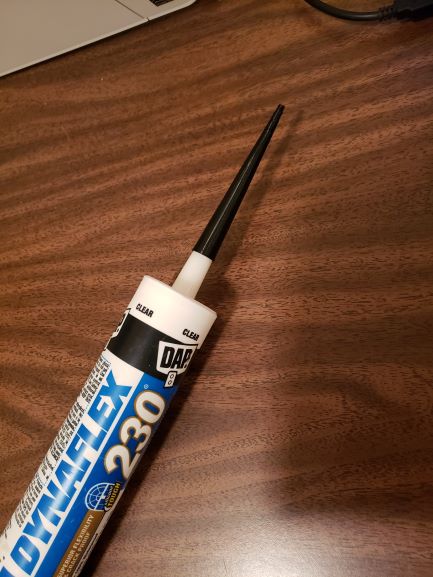Caulking tube nozzle extention