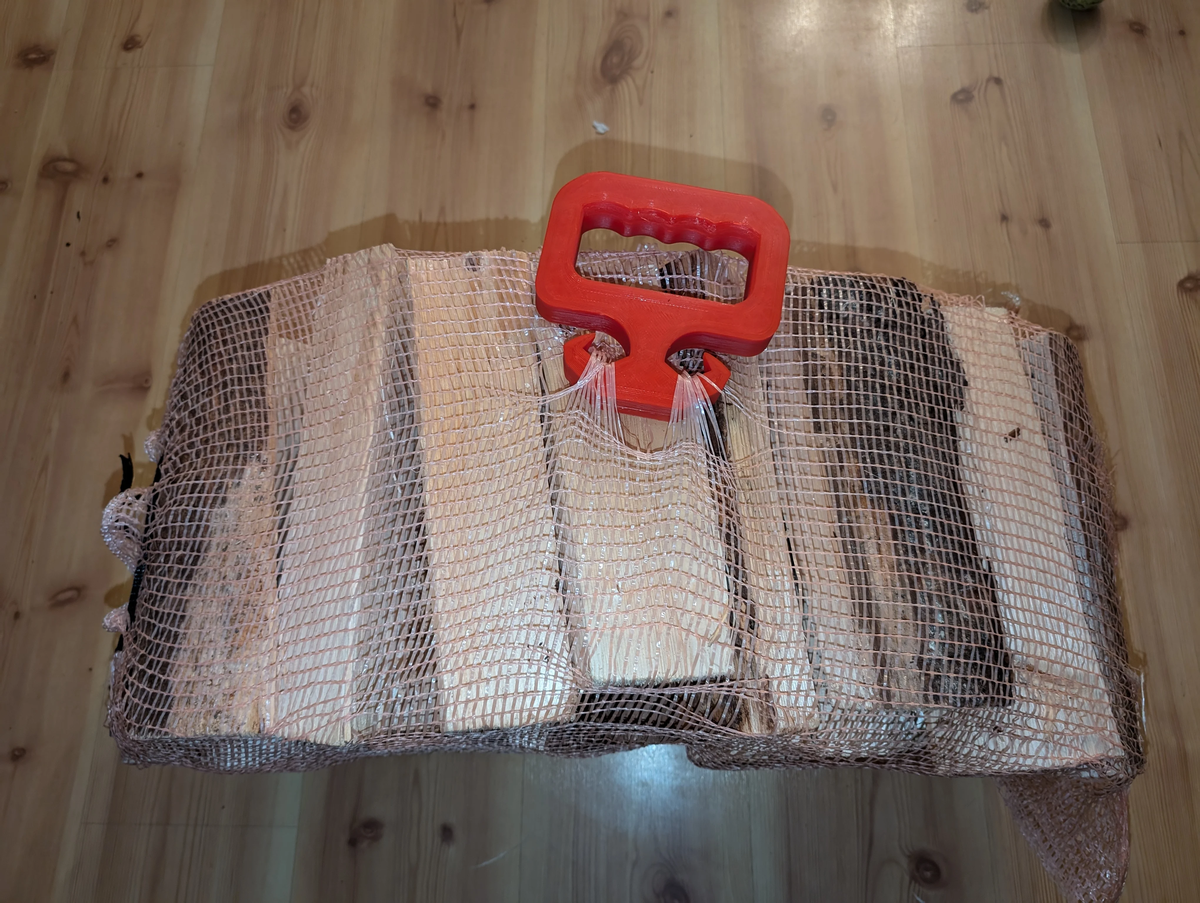 Ergonomic bag hook for firewood and groceries