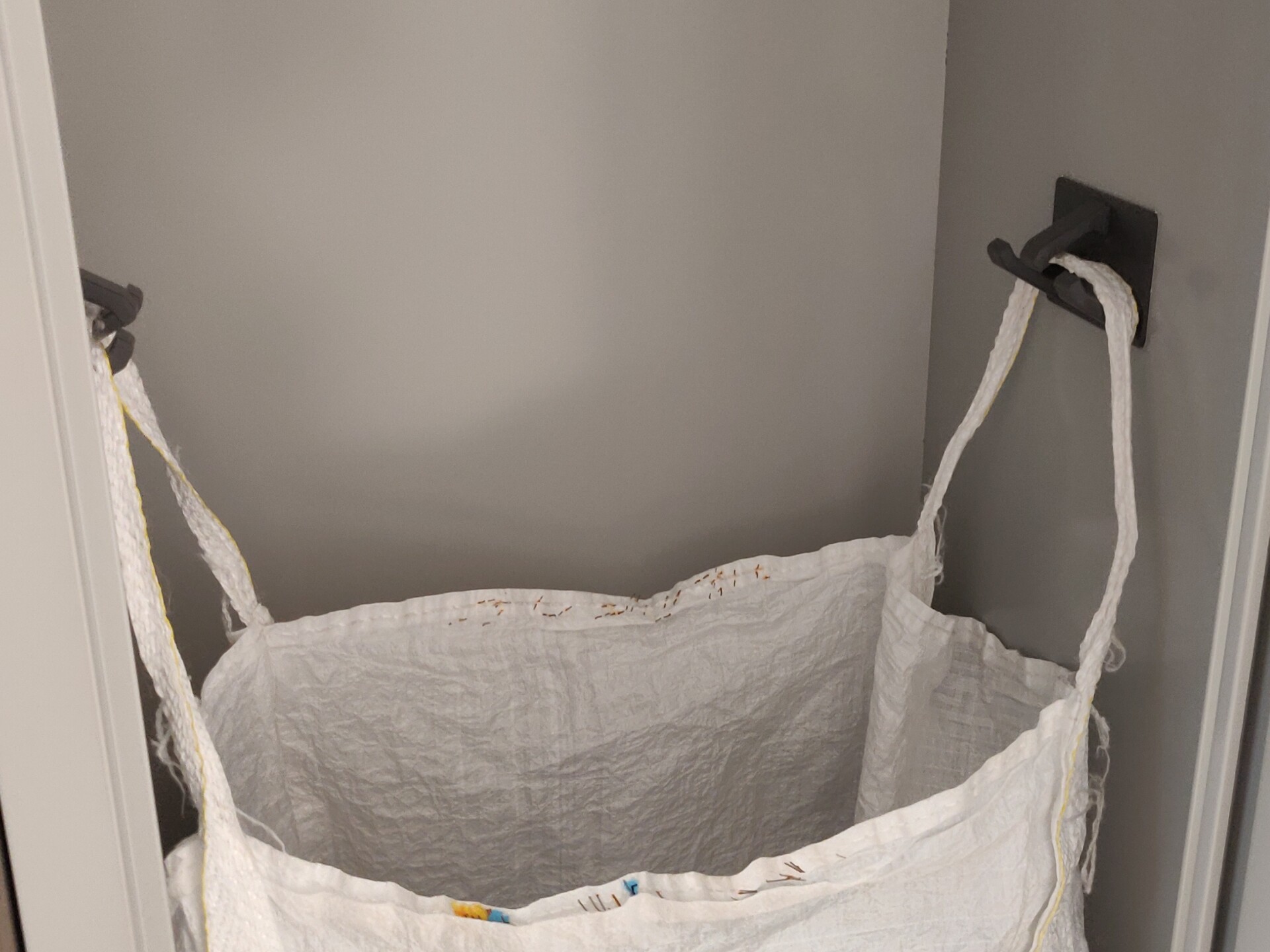 Extra-wide cabinet hook for coat chute / bag
