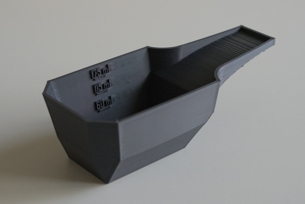 Measuring scoop washing powder